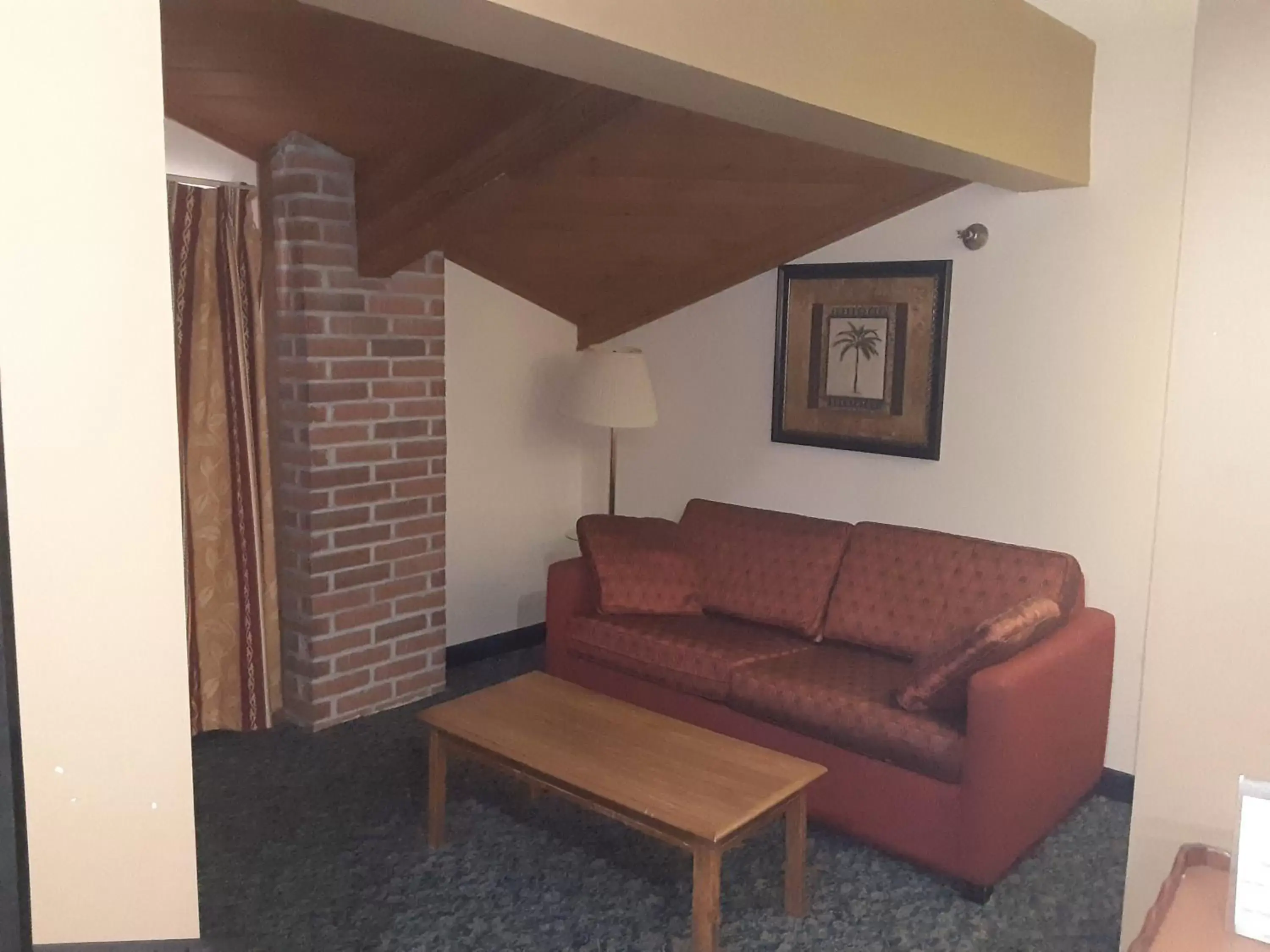 Seating Area in American Inn and Suites Ionia