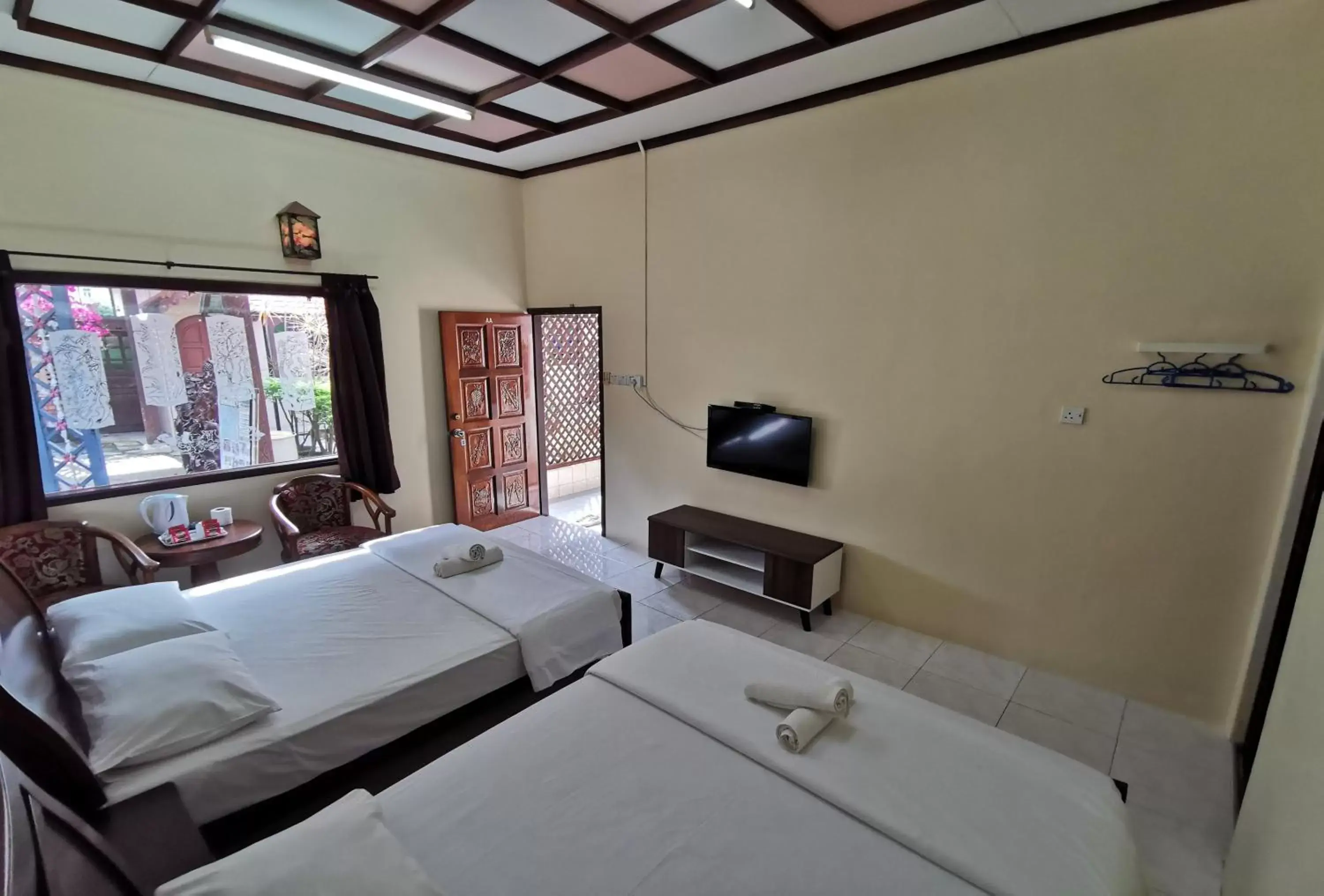 Bed in Sabak Awor Resort