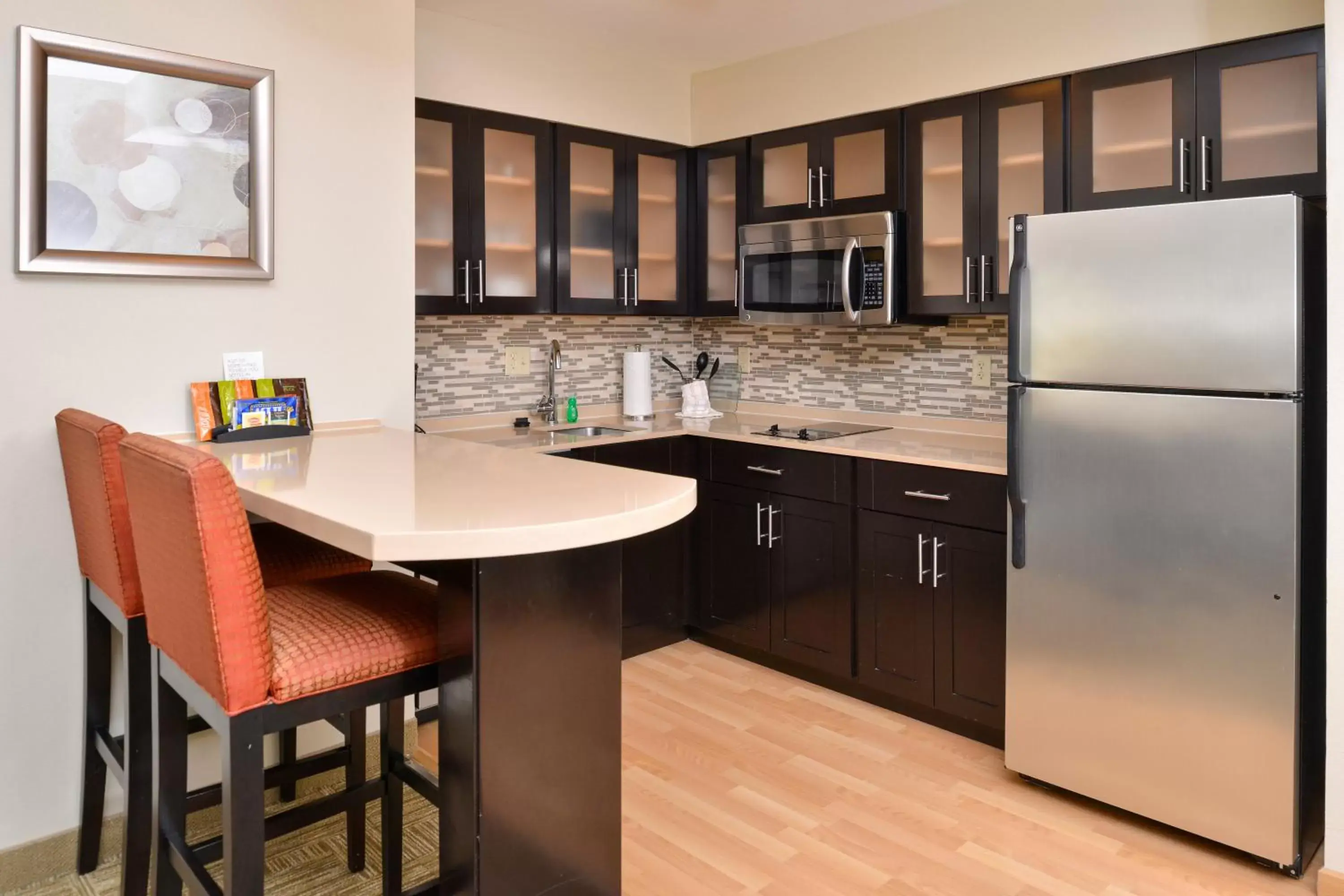 Photo of the whole room, Kitchen/Kitchenette in Staybridge Suites San Antonio-Stone Oak, an IHG Hotel