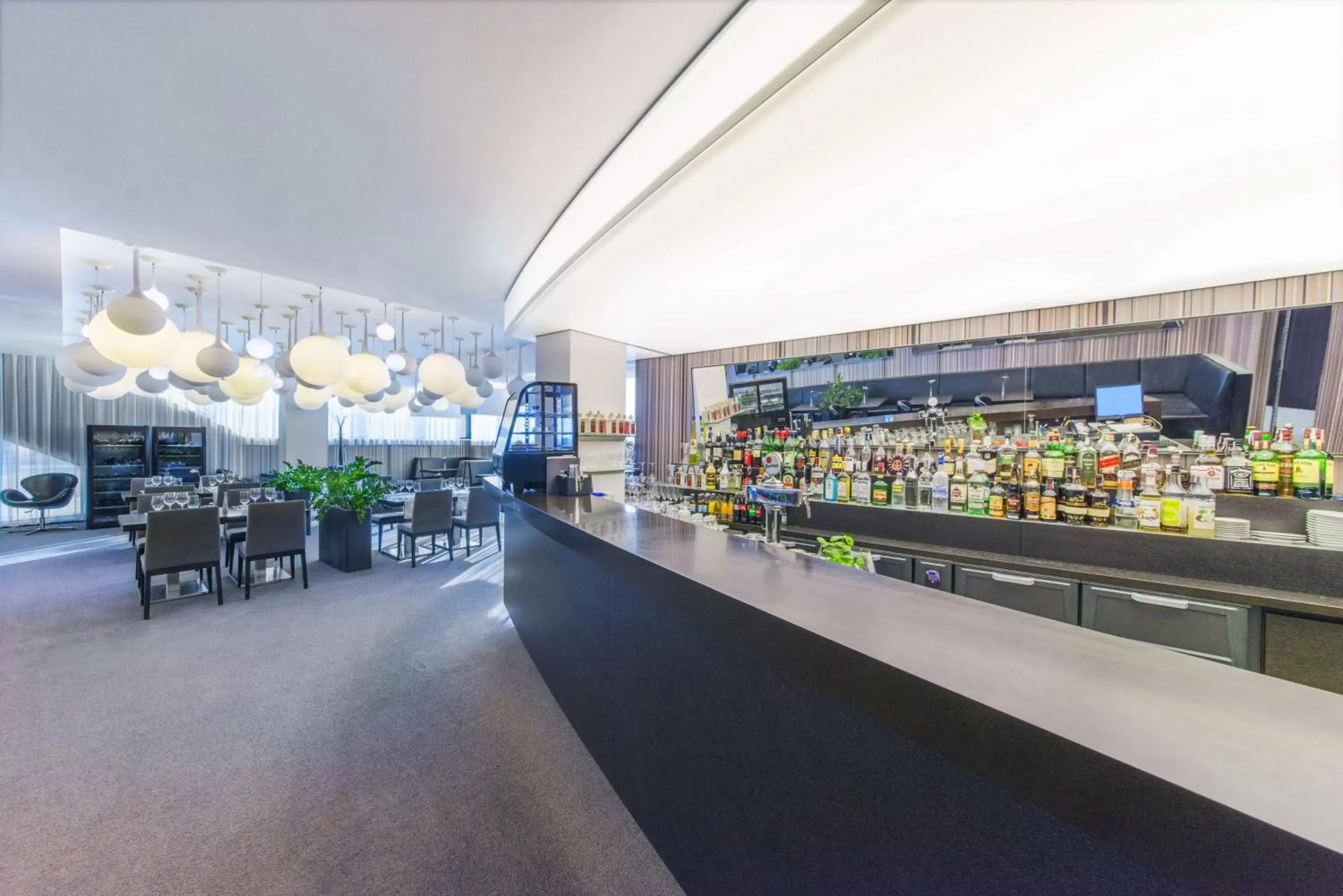 Lounge or bar in NH Bratislava Gate One Lounge or bar in NH Bratislava Gate One
