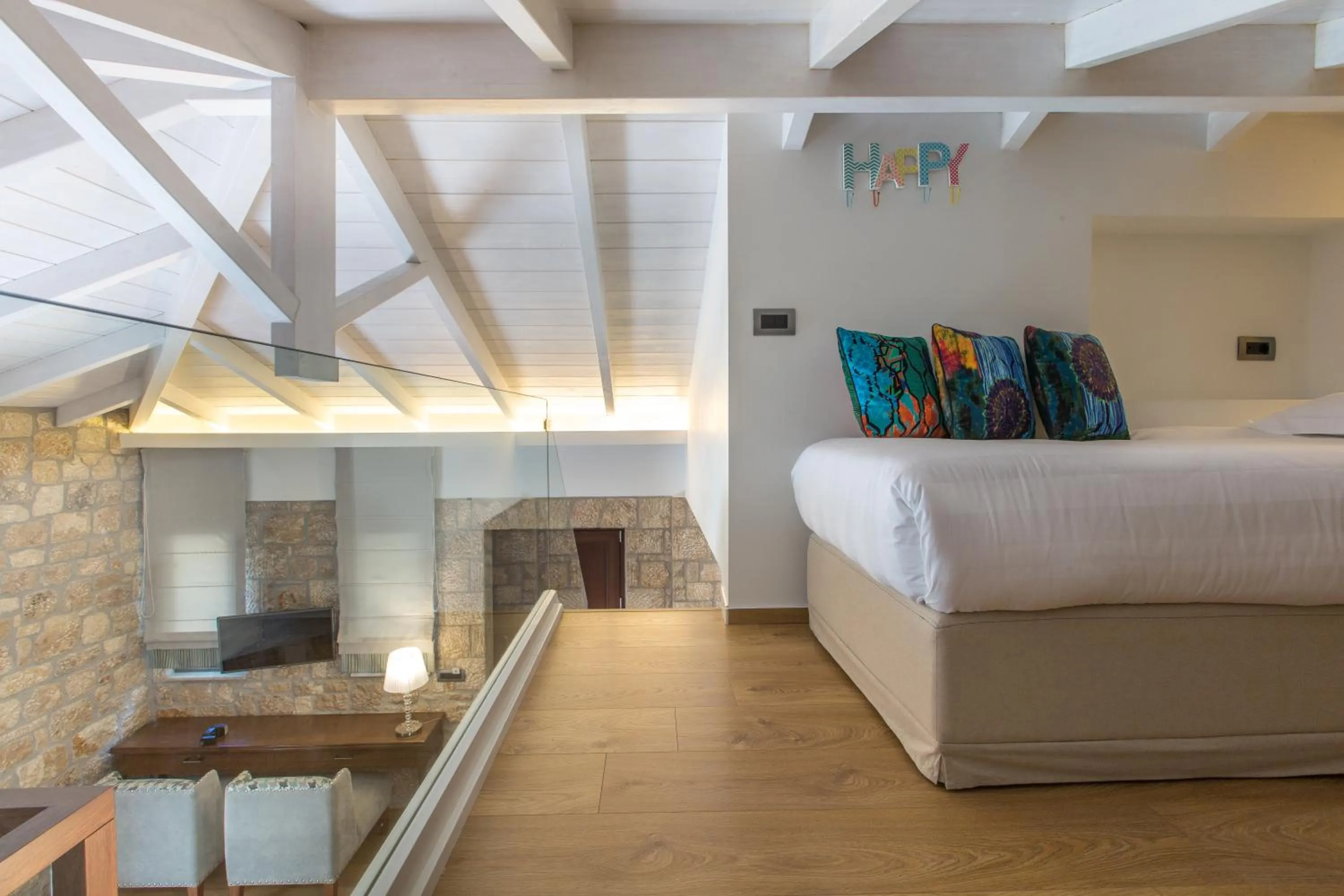 Bed in Anthemion Suites and Villas