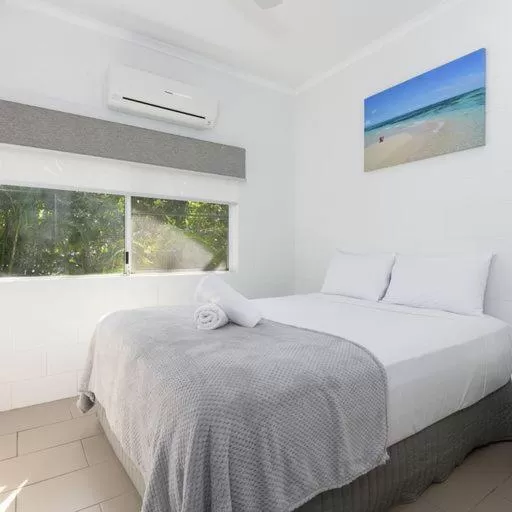 Bed in TiTree Village Holiday Apartments