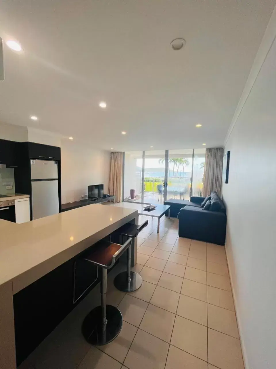 Living room, Bathroom in at Marina Shores