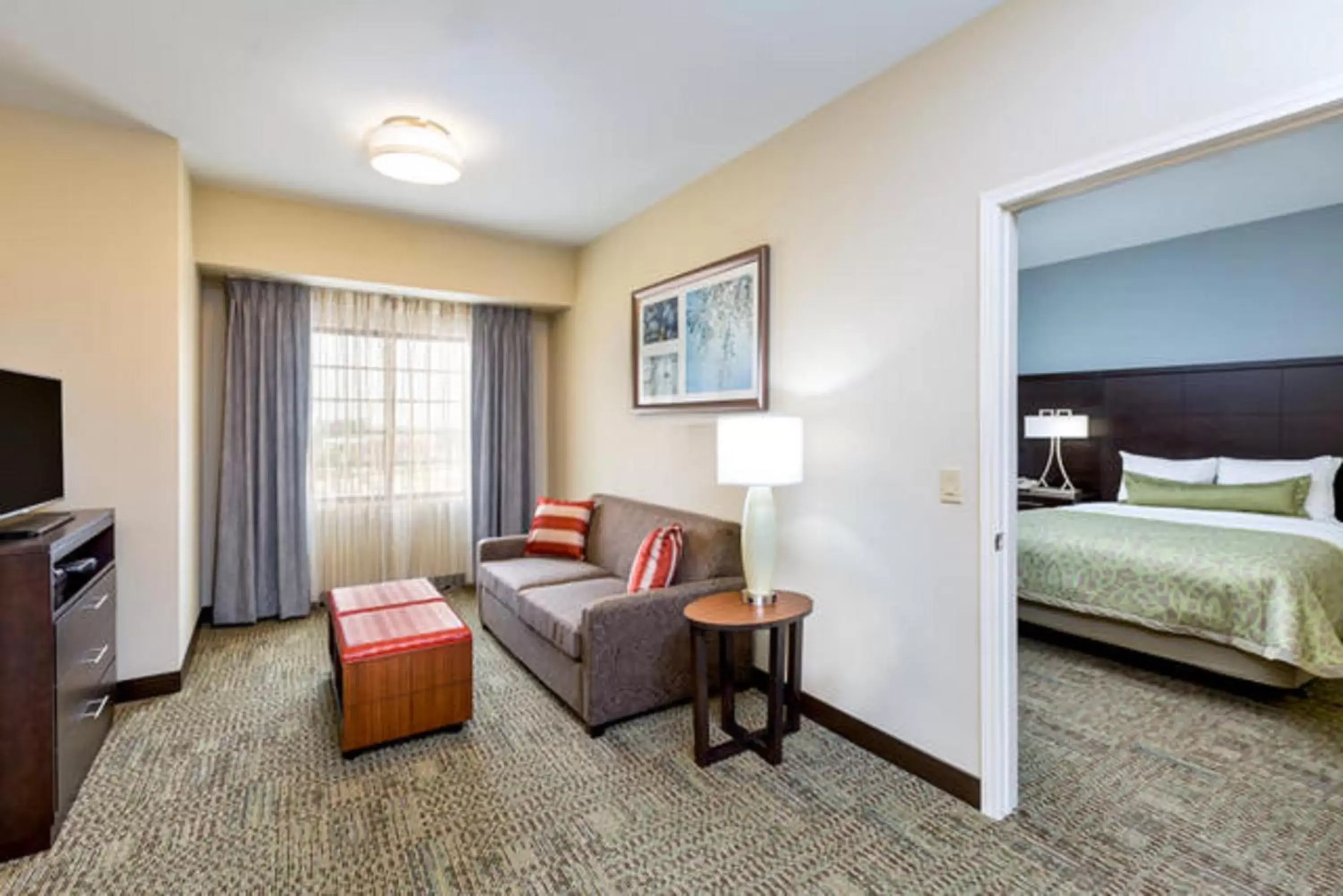 Photo of the whole room, Seating Area in Staybridge Suites College Station, an IHG Hotel