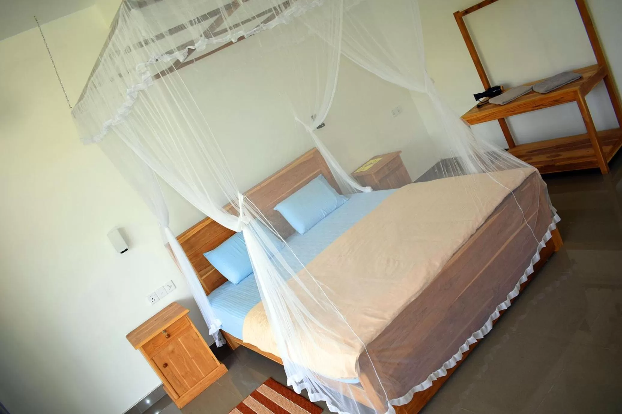 Photo of the whole room, Bed in Raveena Guest House