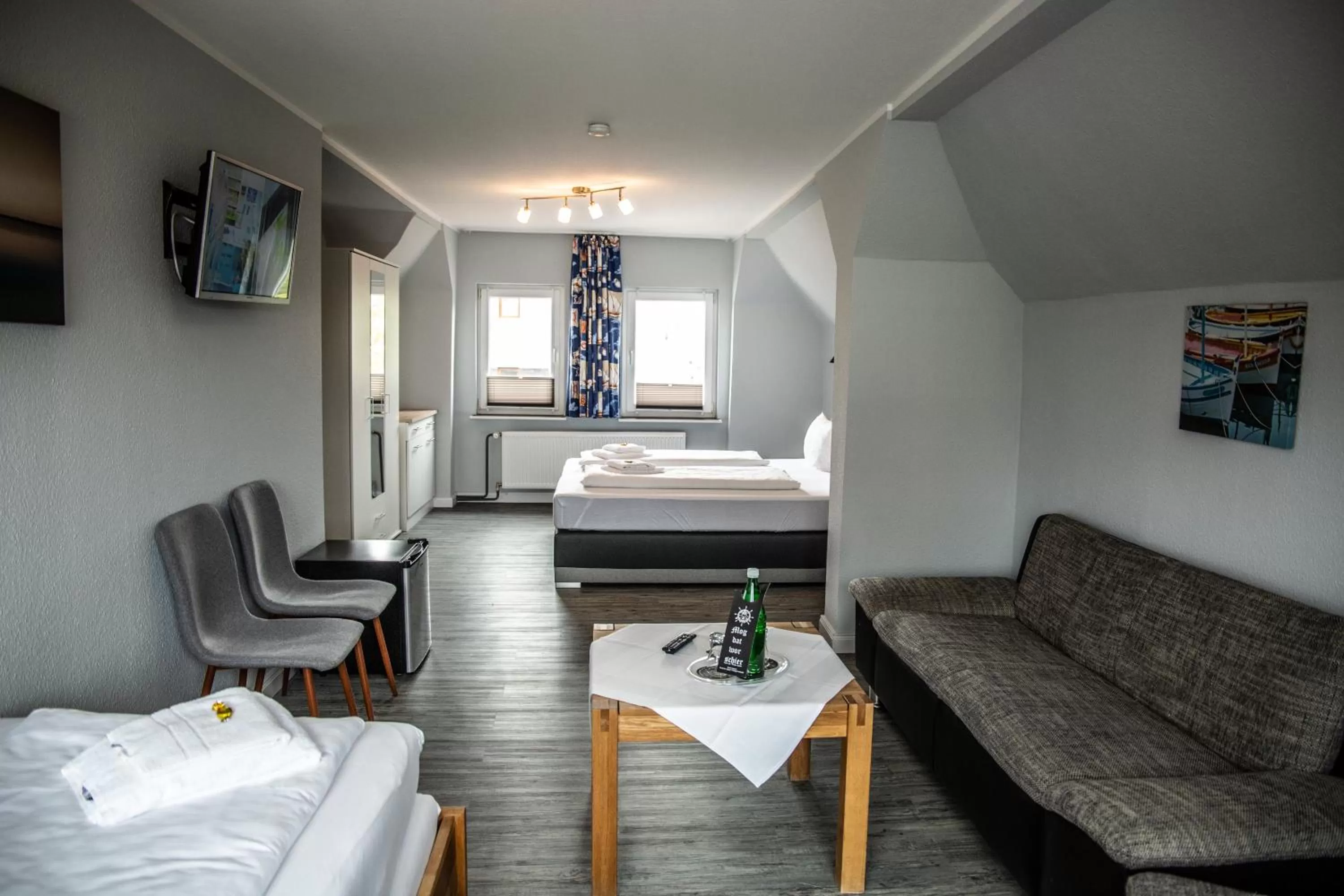 Living room, Bed in Hotel Tum Stüürmann