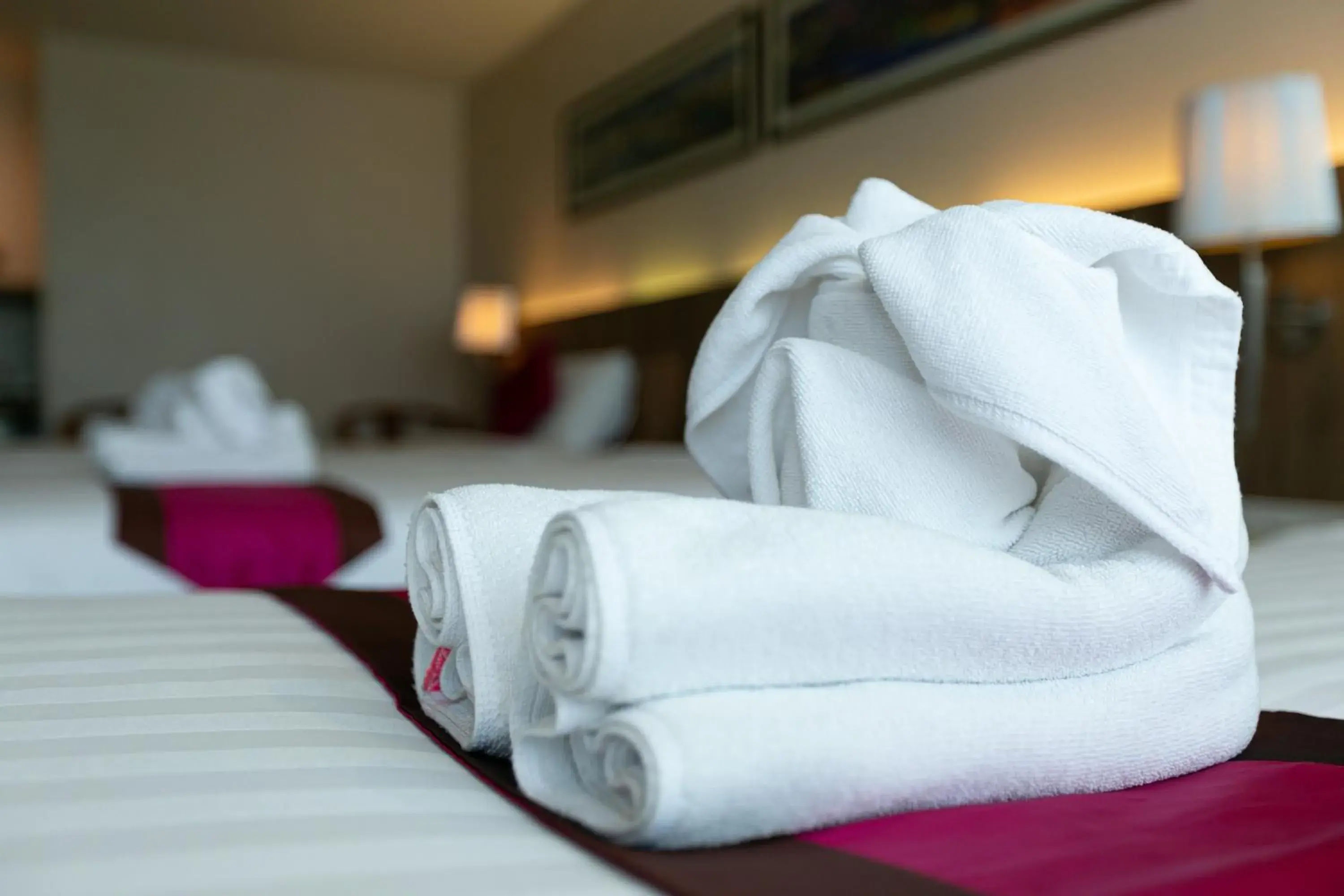 towels, Bed in Grand Ratchapruek Hotel