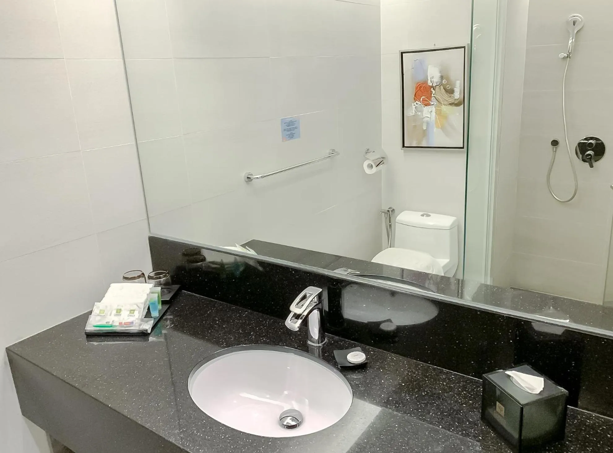 Bathroom in Greens Hotel & Suites