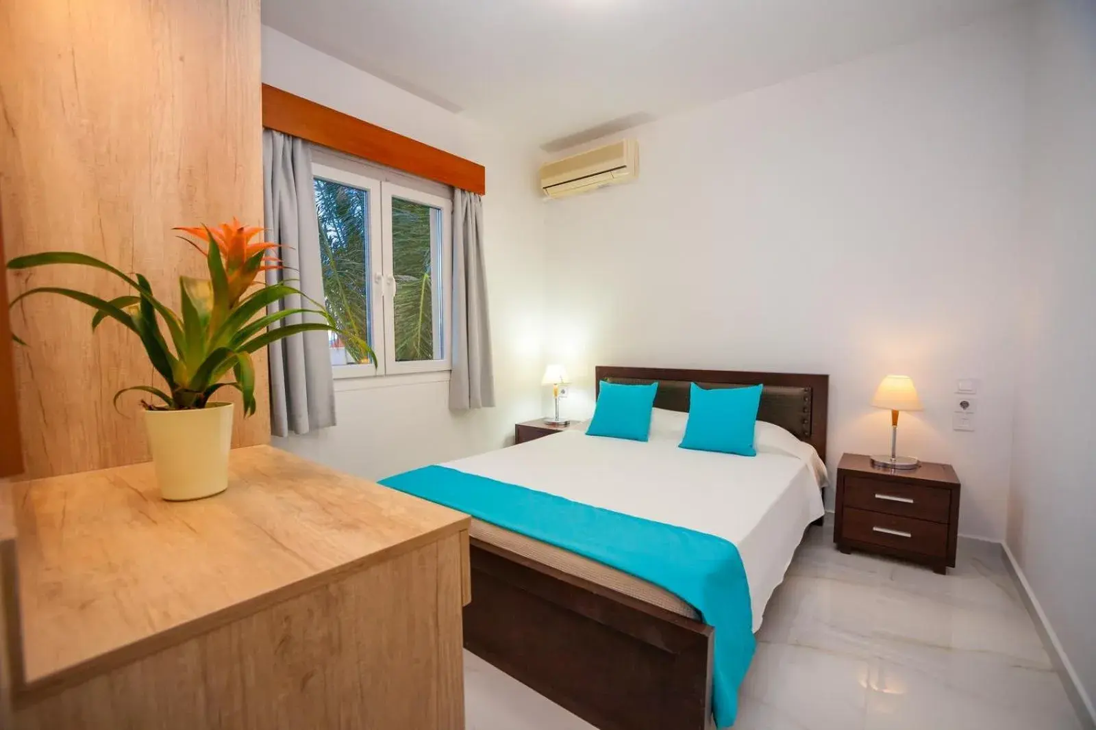 Bed in Elounda Water Park Residence Hotel