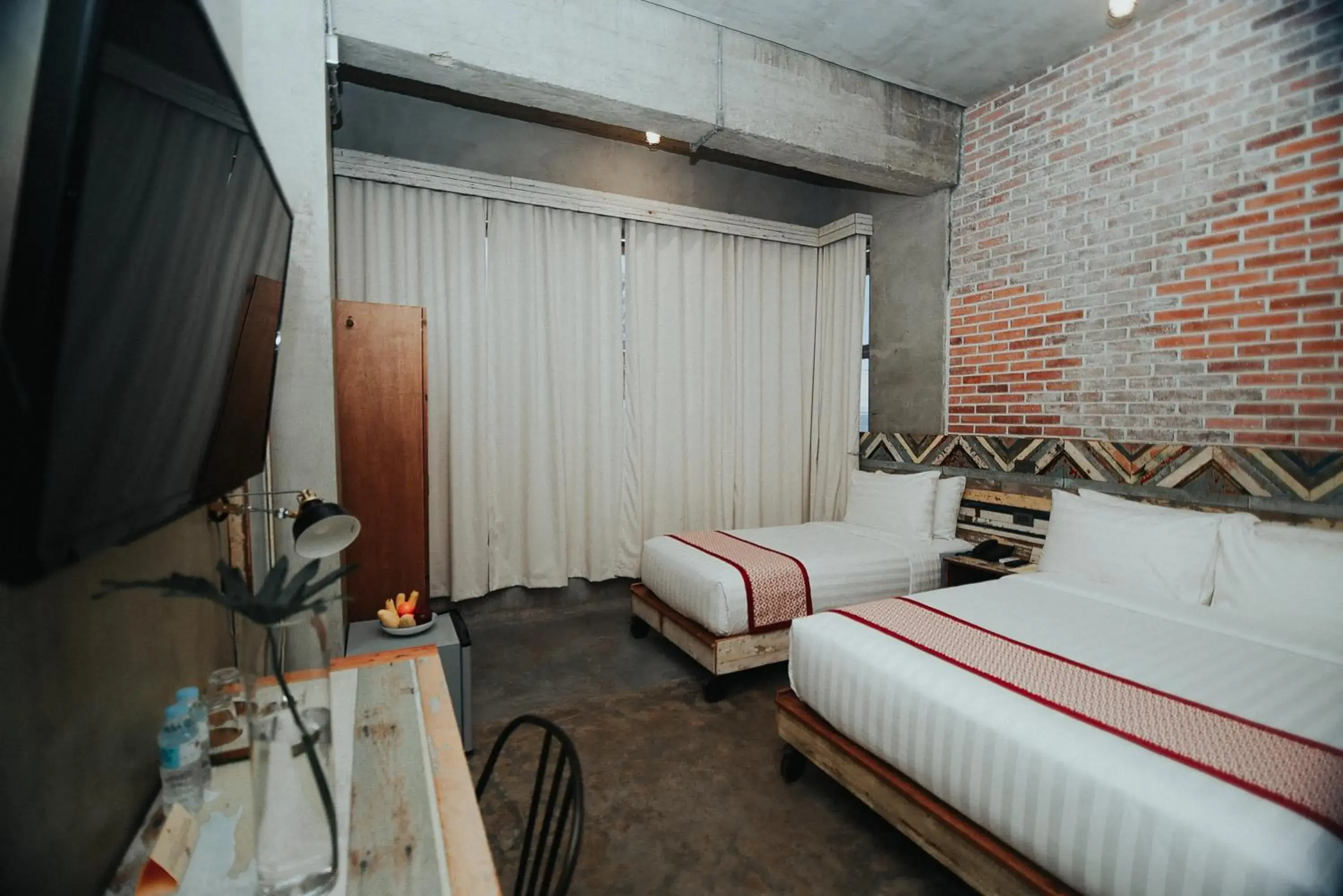 Bed in The Bricks Hotel