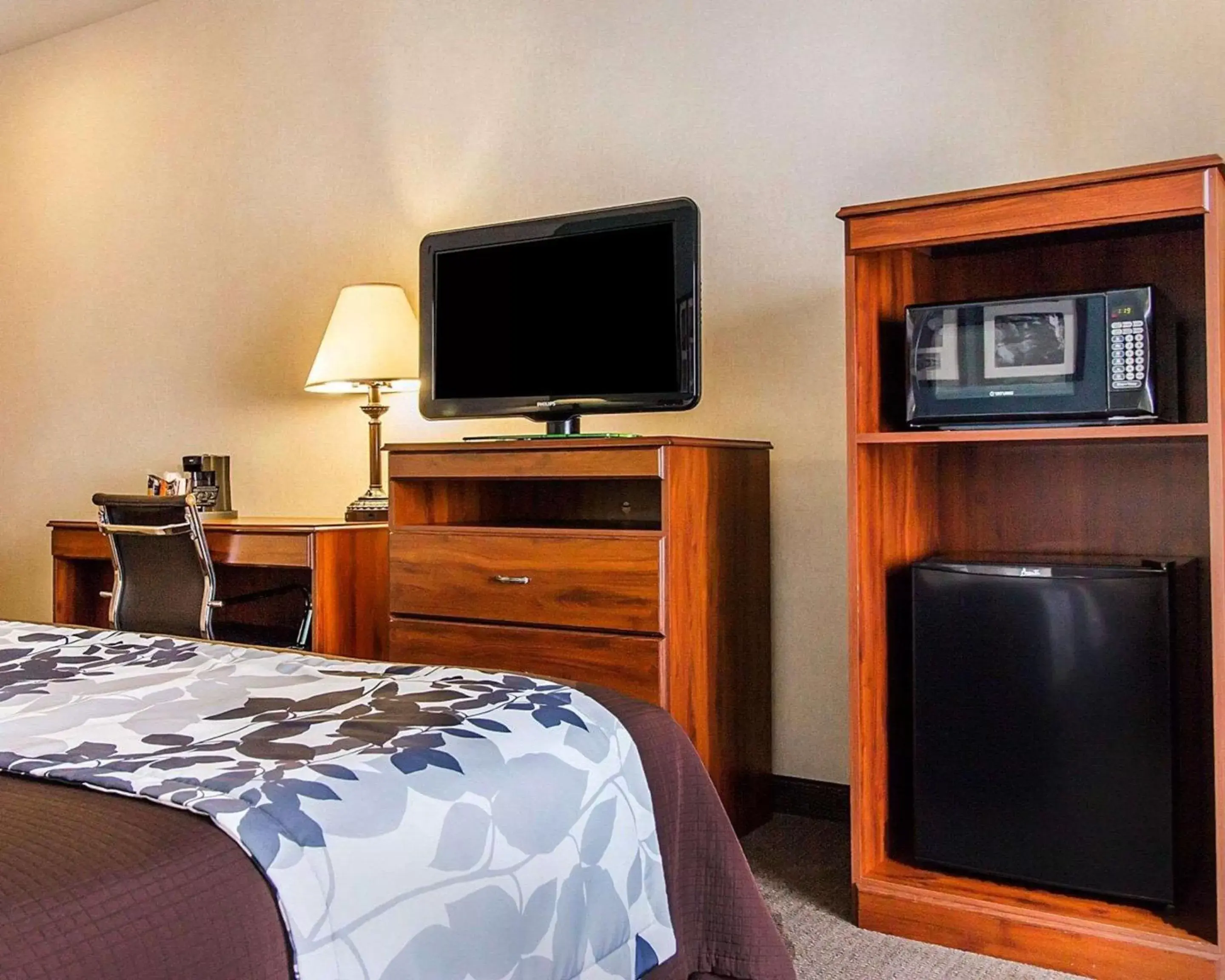 Photo of the whole room, TV/Entertainment Center in Sleep Inn & Suites Evansville