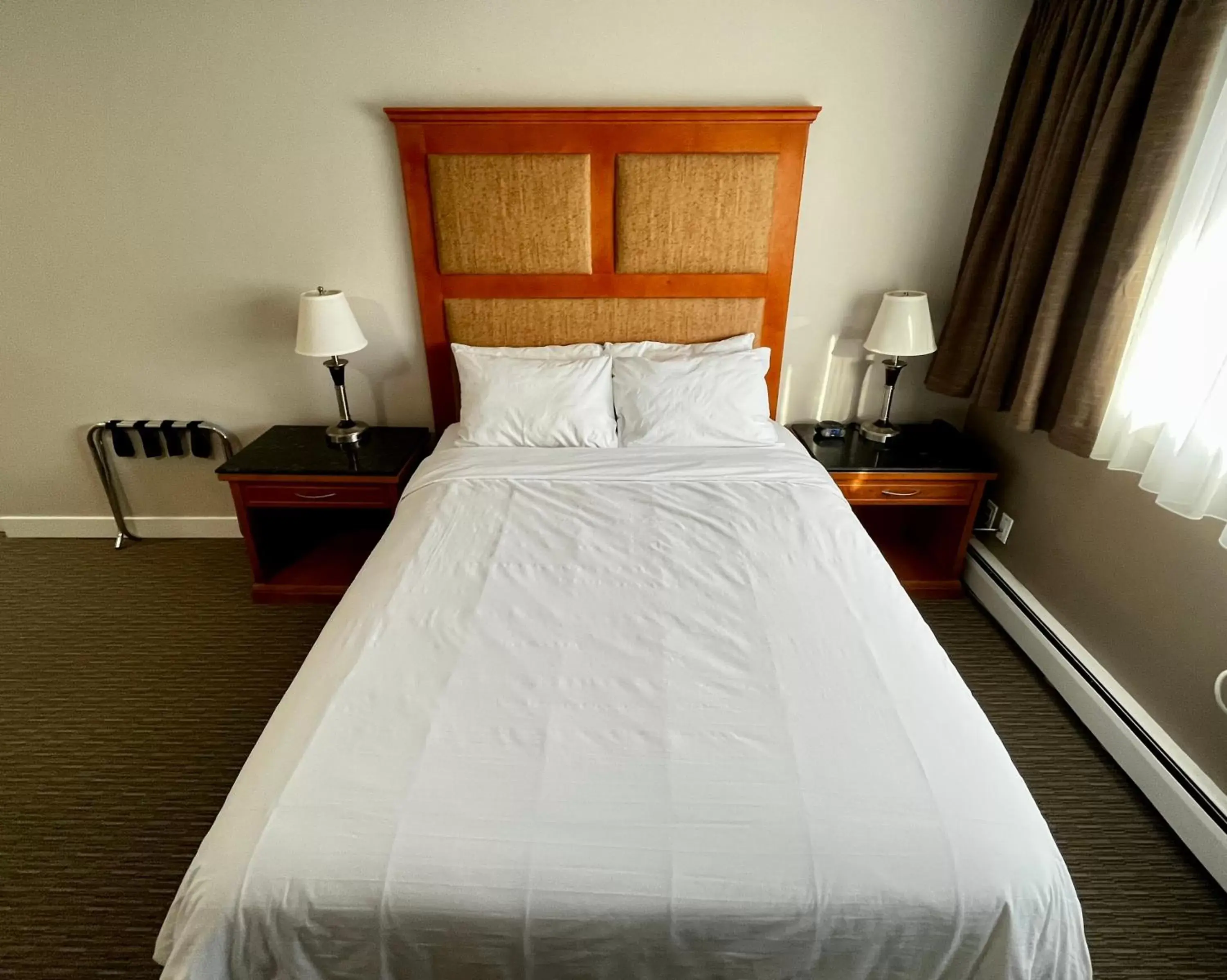 Bed in Anavada Inn & Suites - Prince George