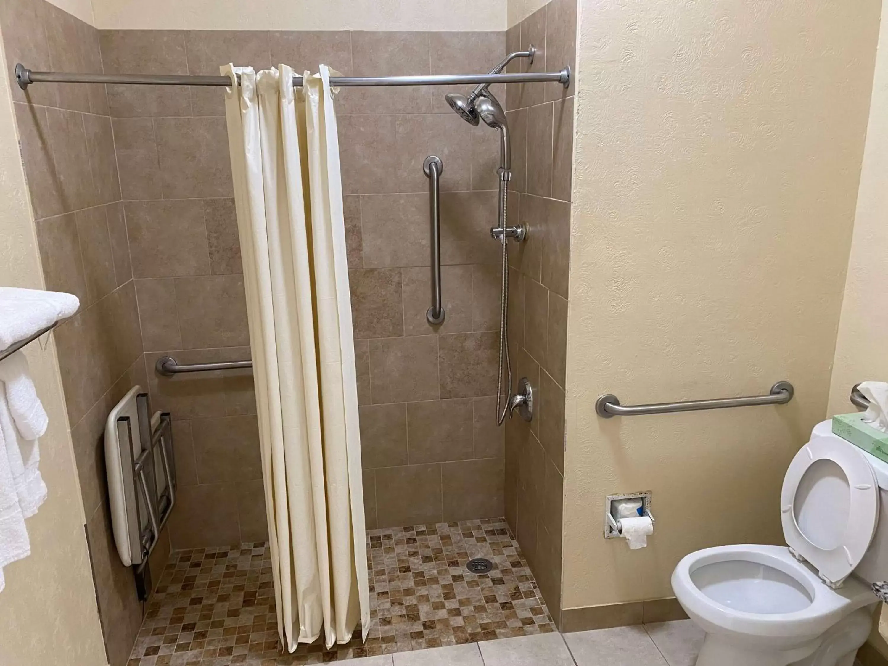 Bathroom in SureStay Hotel by Best Western Fort Pierce