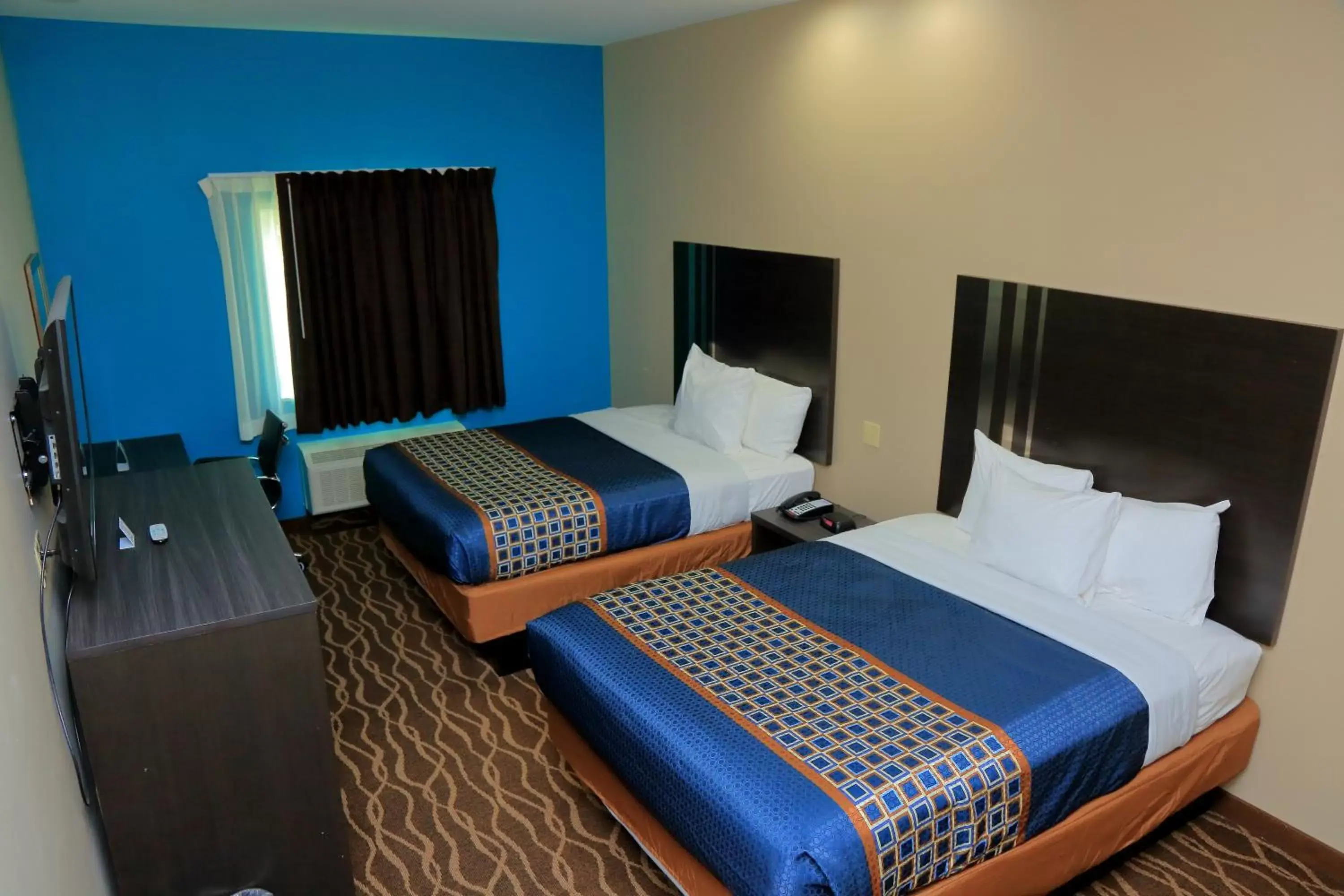 Bed in Americas Best Value Inn & Suites-Prairieville