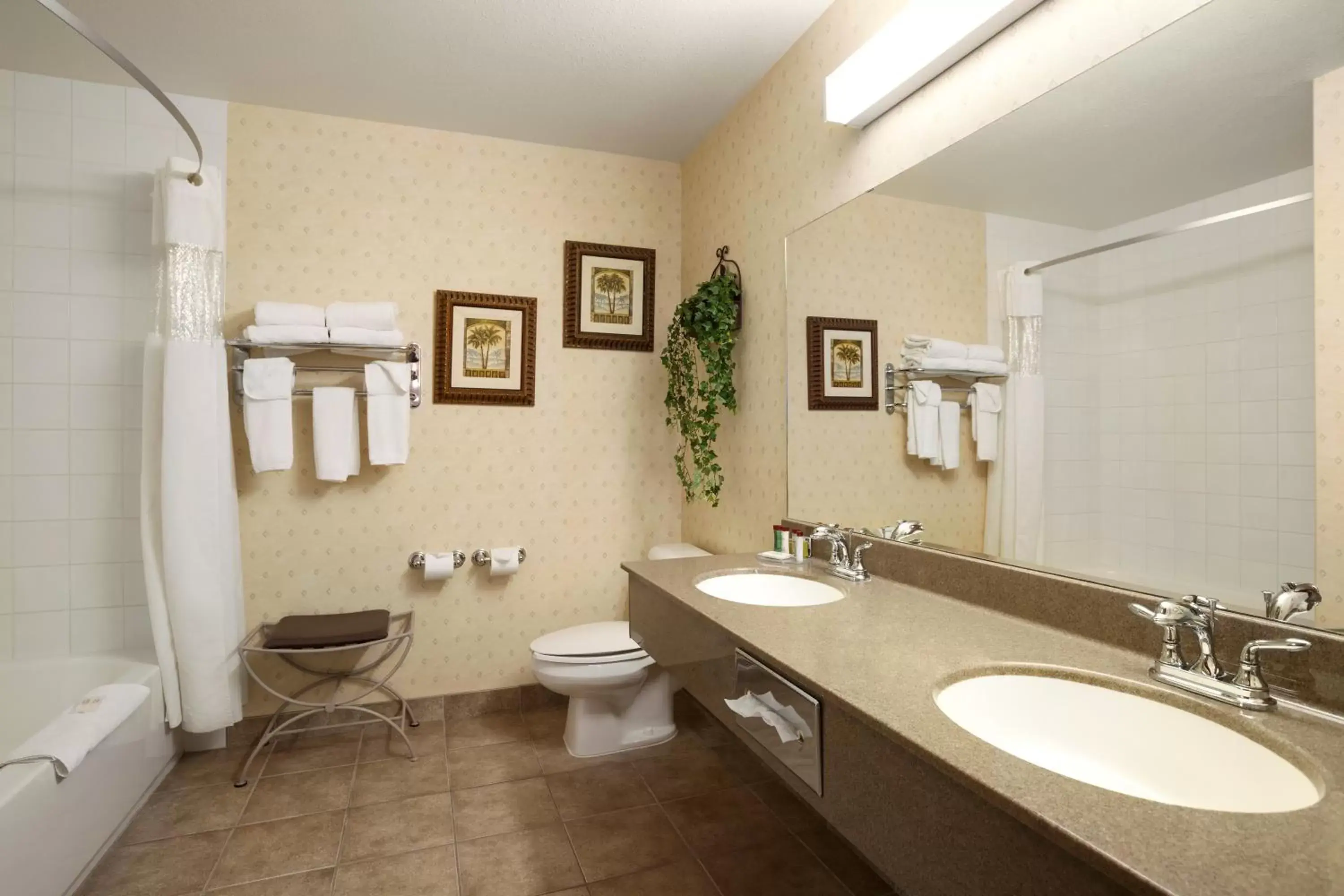 Bathroom in Ramada by Wyndham Clairmont/Grande Prairie