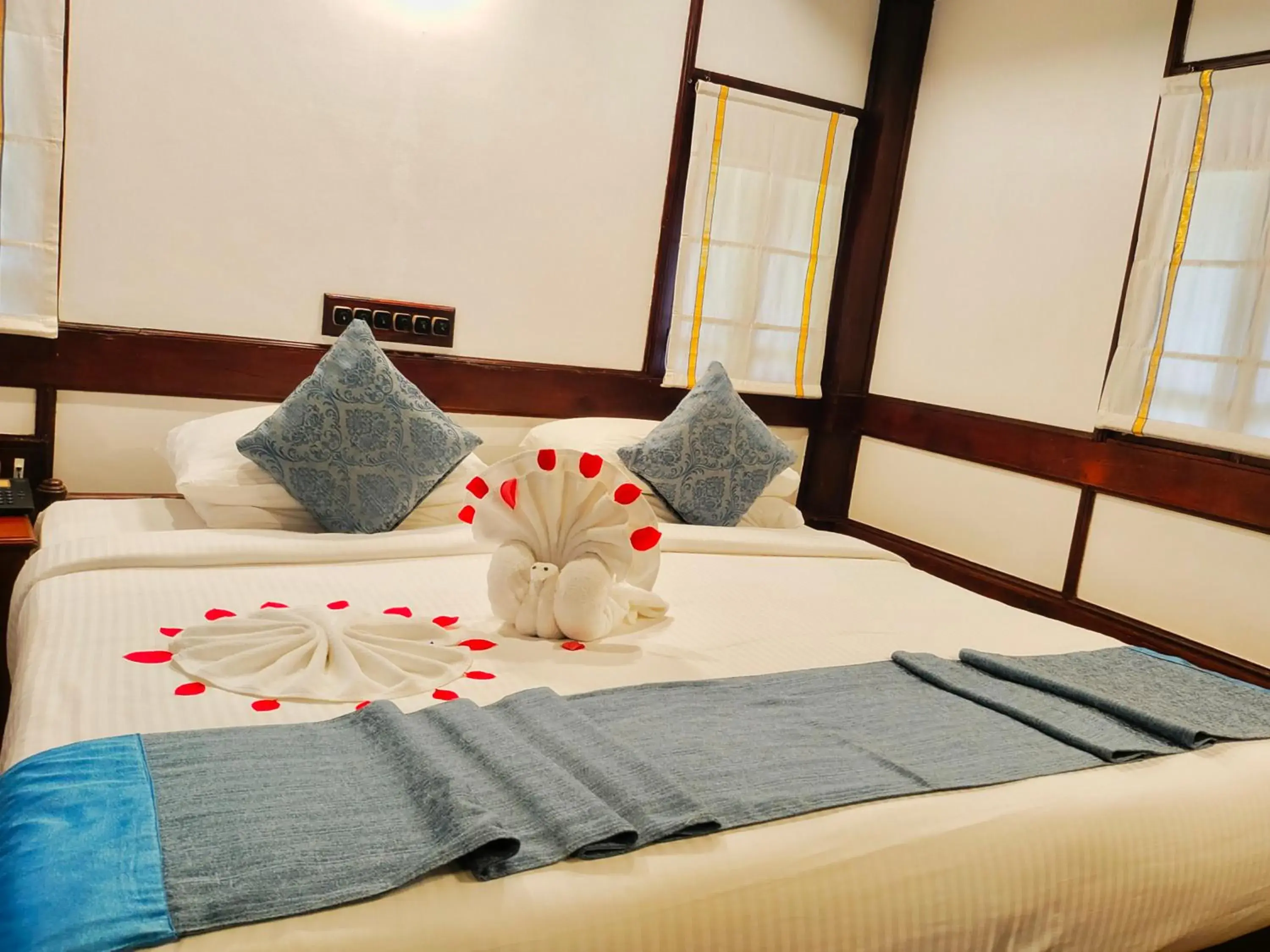 Bed in The Travancore Heritage Beach Resort