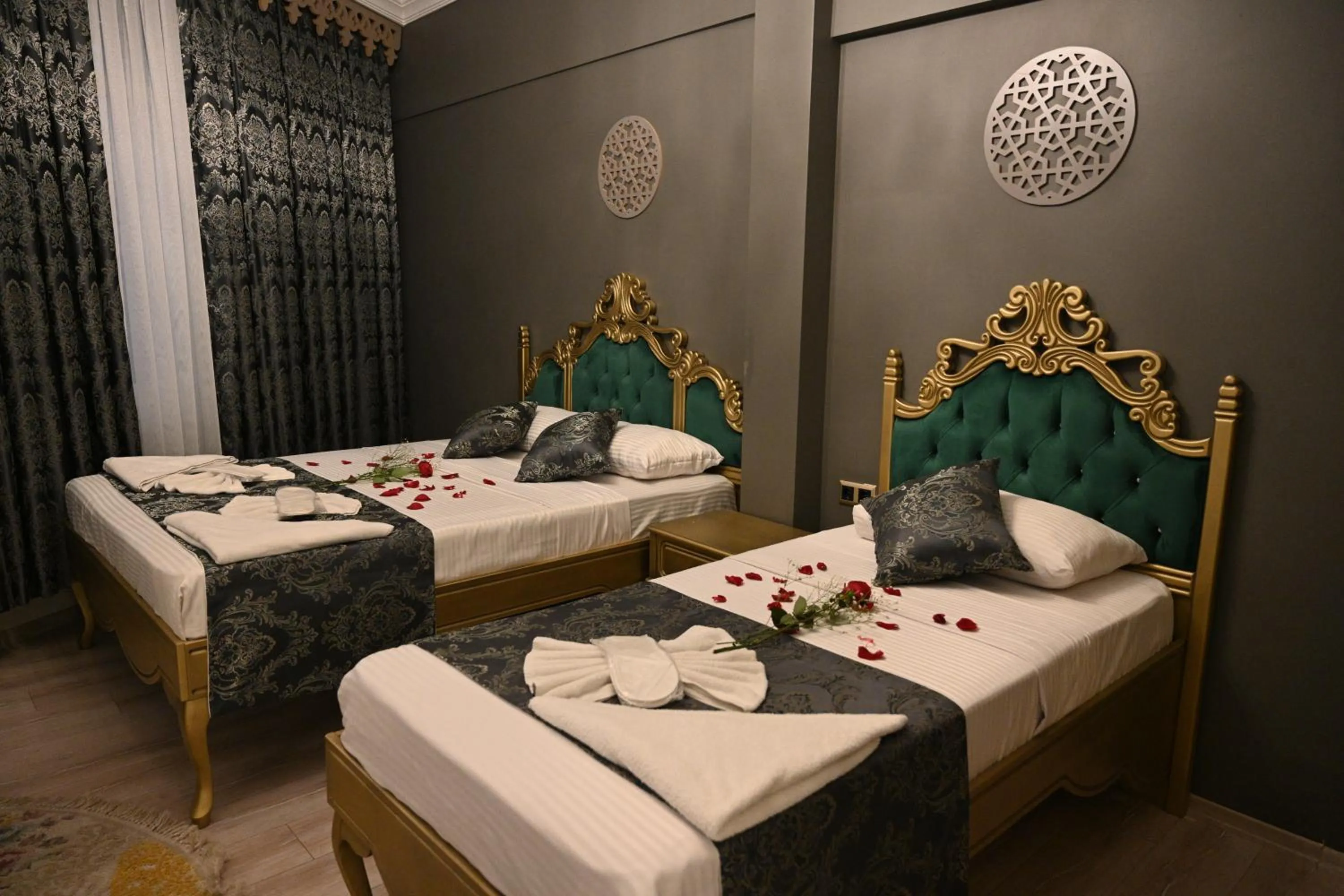 Bed in Ethnica Suites