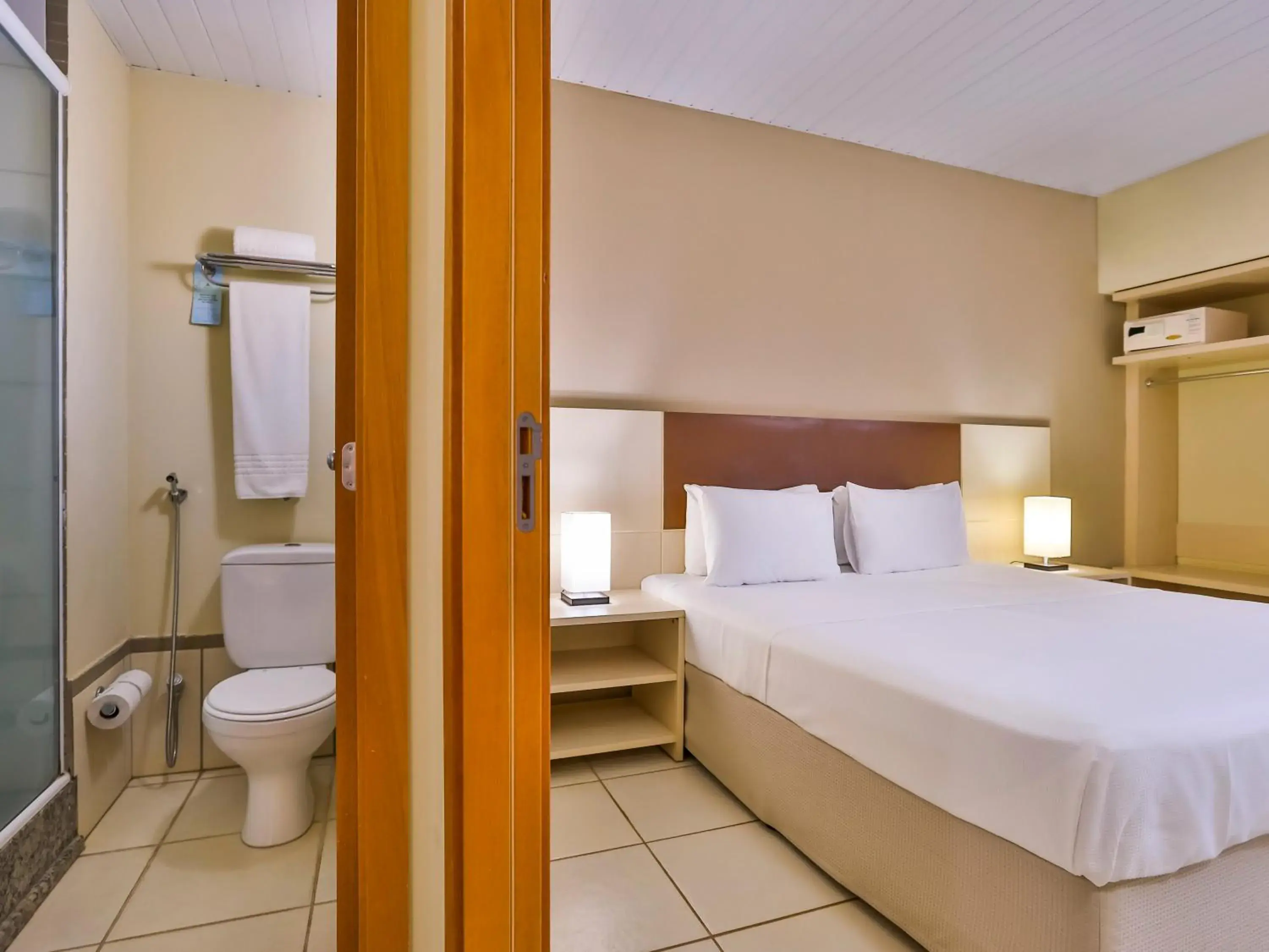 Bed, Bathroom in Thermas de Olimpia Resorts by Mercure