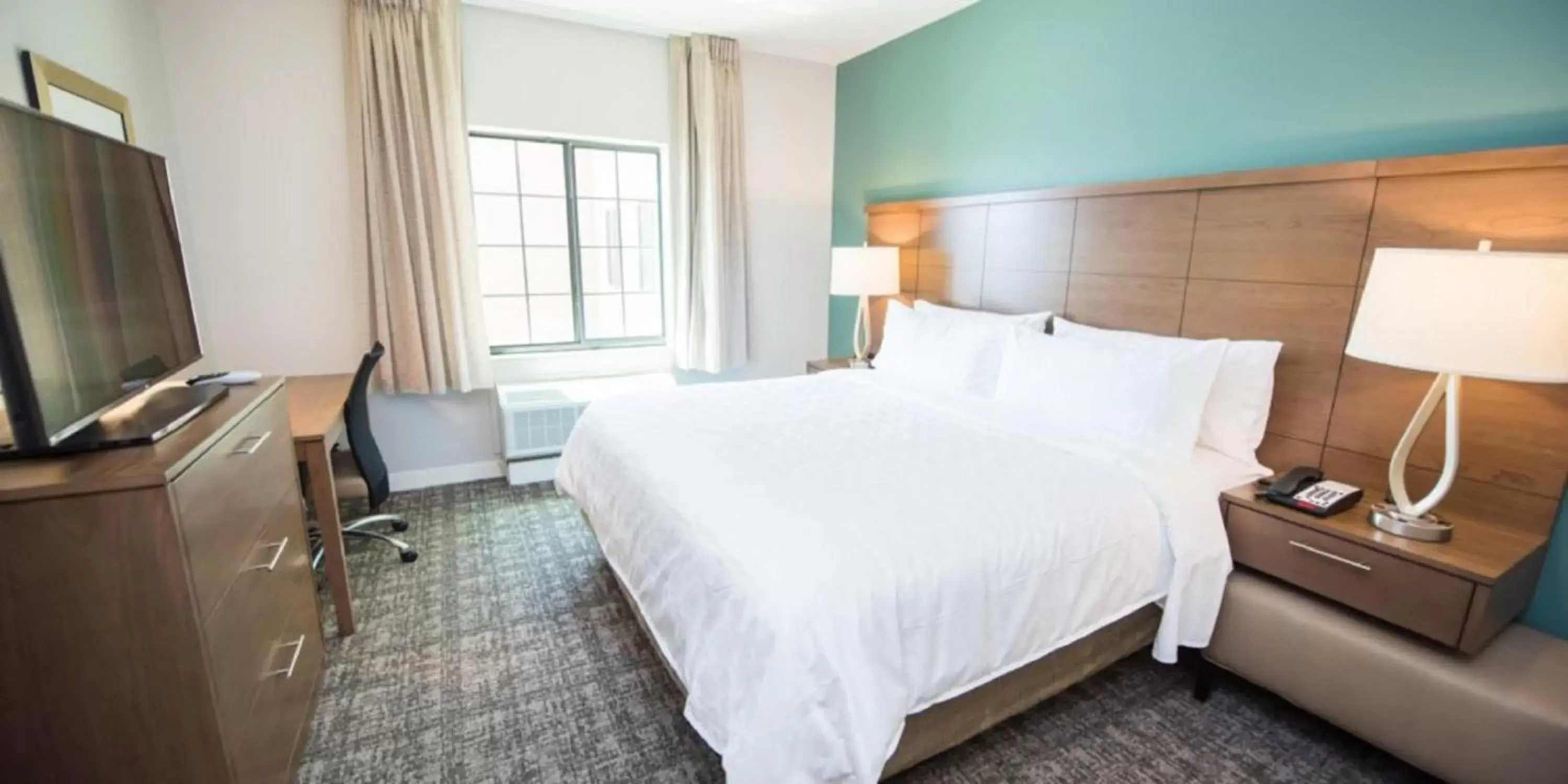 Photo of the whole room, Bed in Staybridge Suites Houston East - Baytown, an IHG Hotel