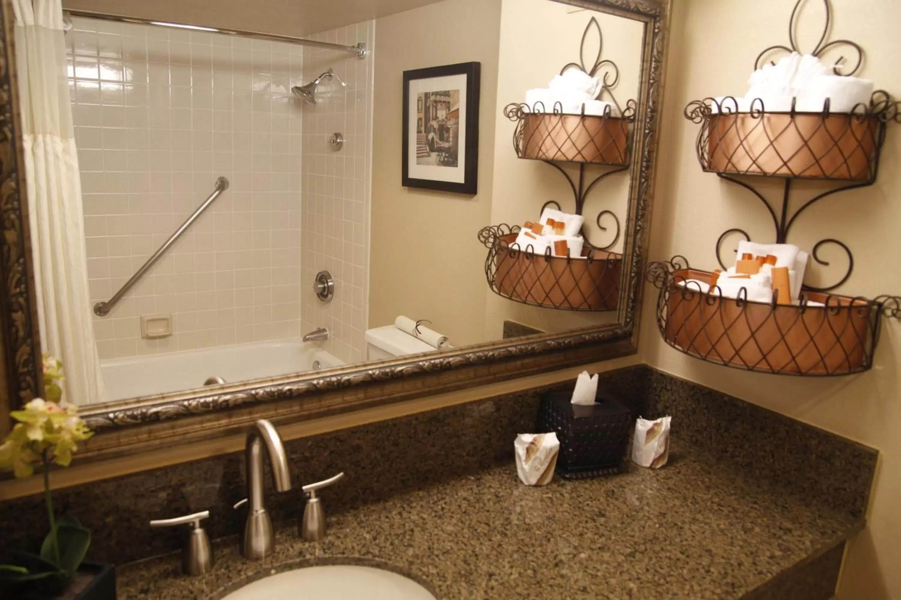 Bathroom in Ramada by Wyndham Viscount Suites Tucson East
