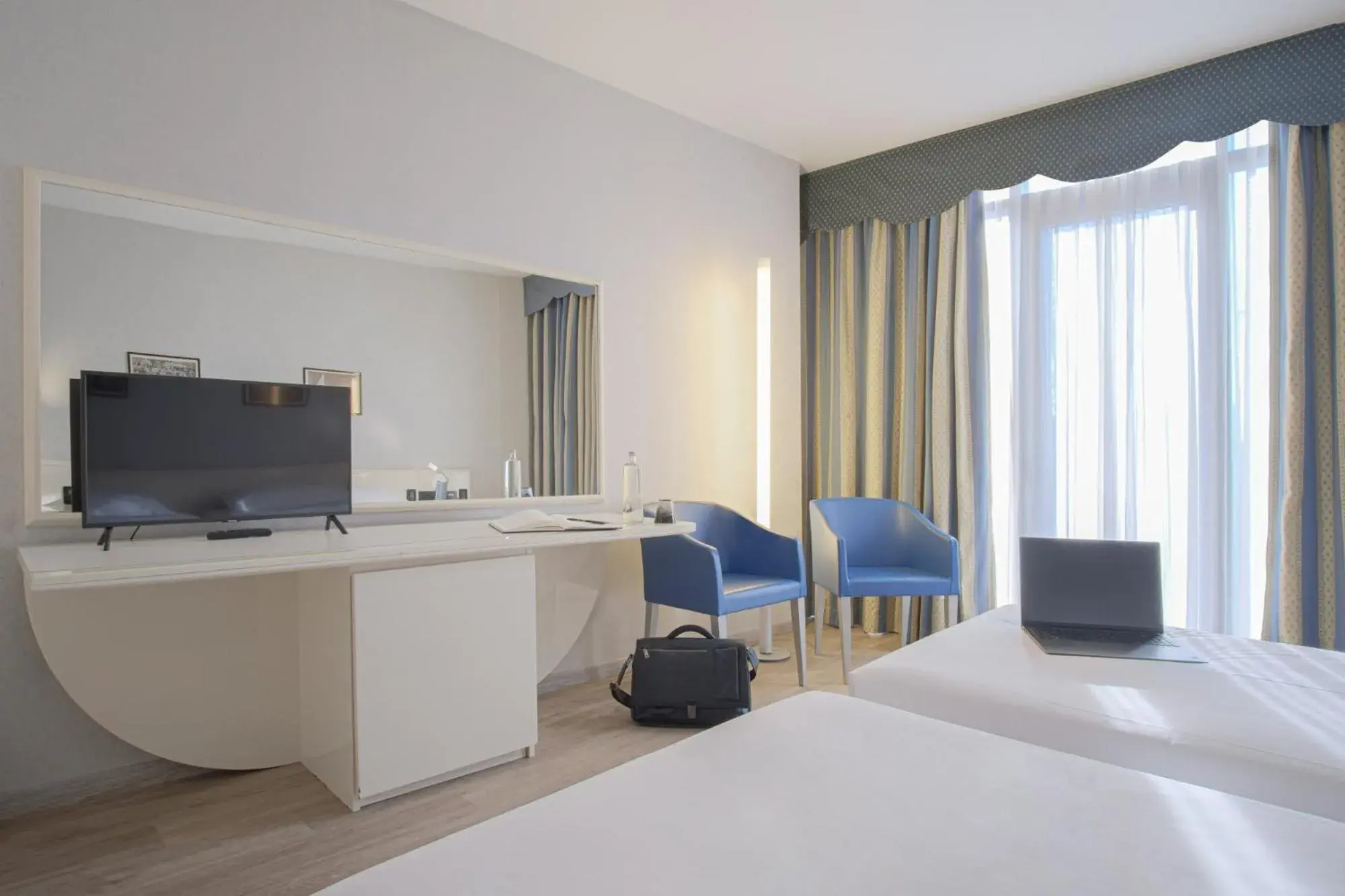 Bed, TV/Entertainment Center in Hotel Viest