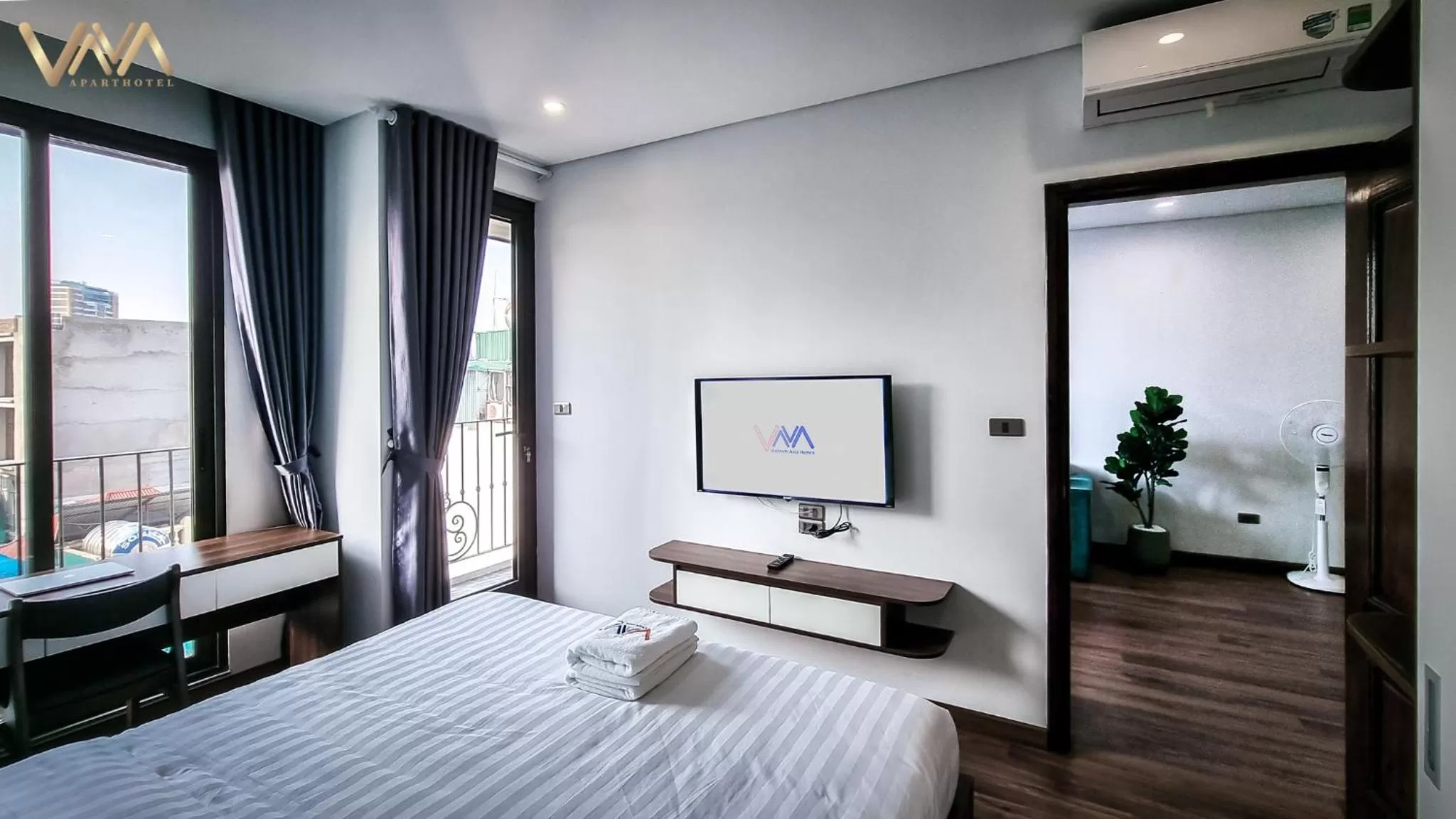 Bed in VNAHOMES APARTHOTEL