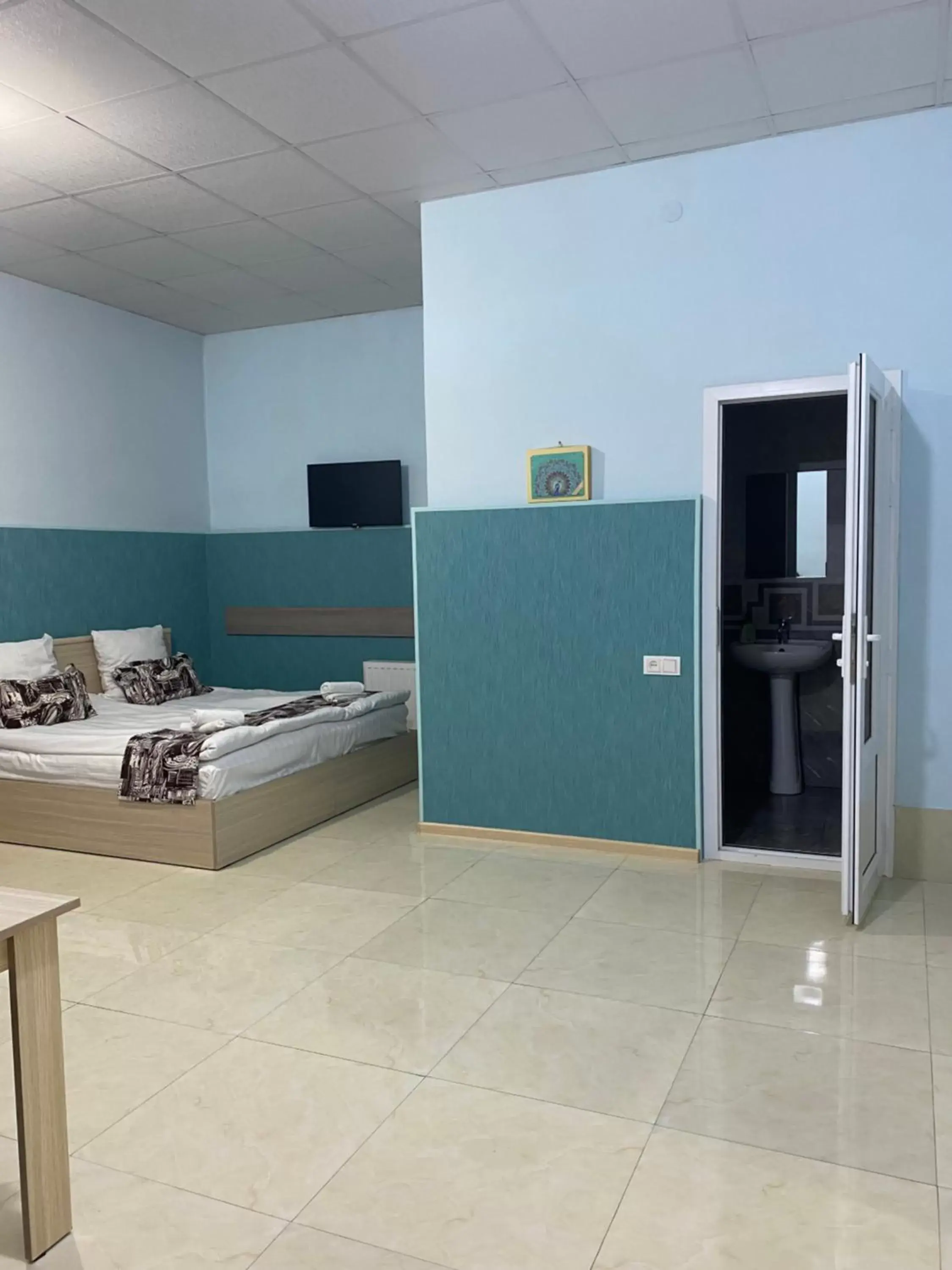 Quadruple Room with Private Bathroom in Lind Guest House B&B Quadruple Room with Private Bathroom in Lind Guest House B&B