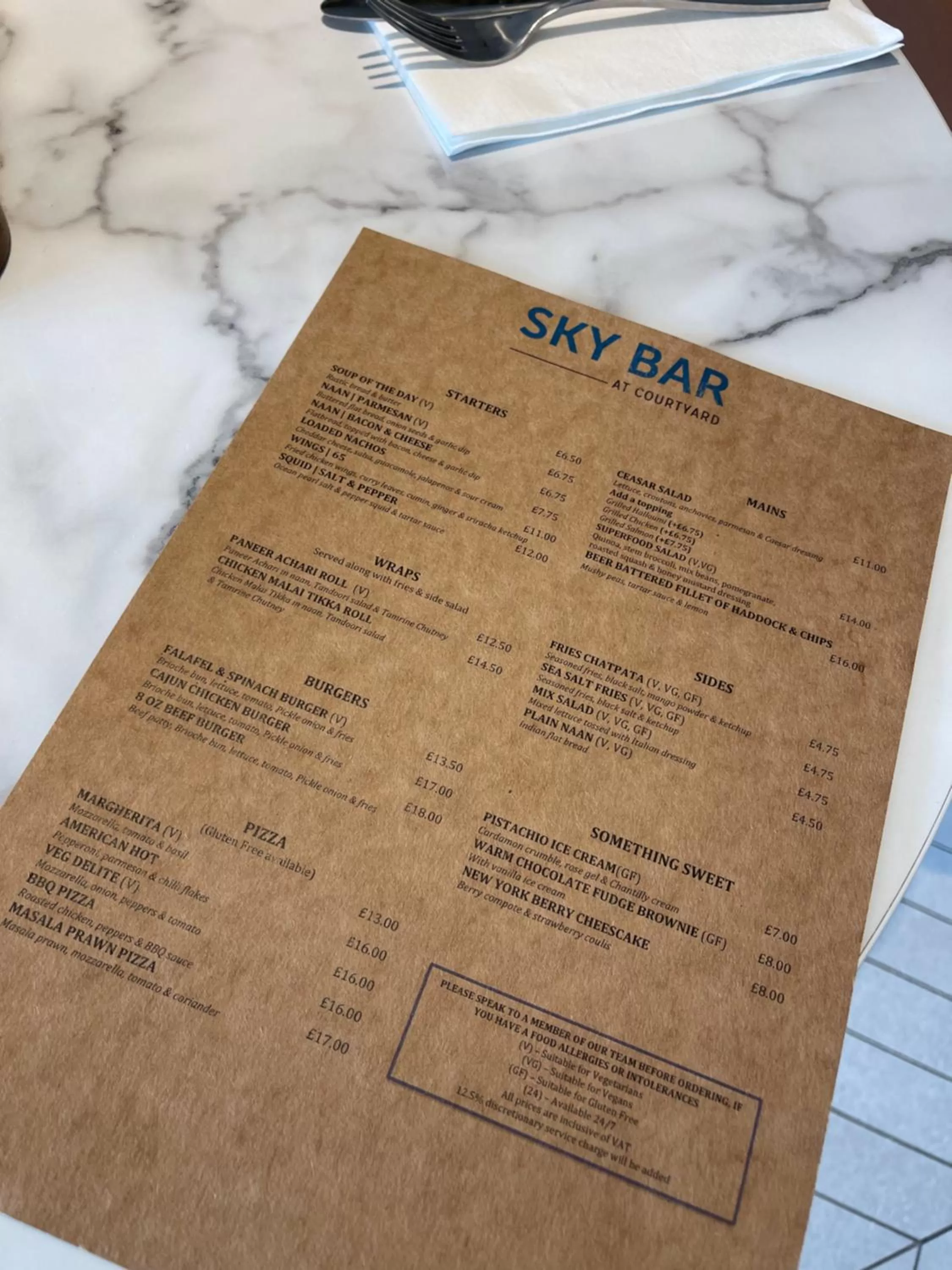 Text overlay in Courtyard by Marriott London Heathrow Airport