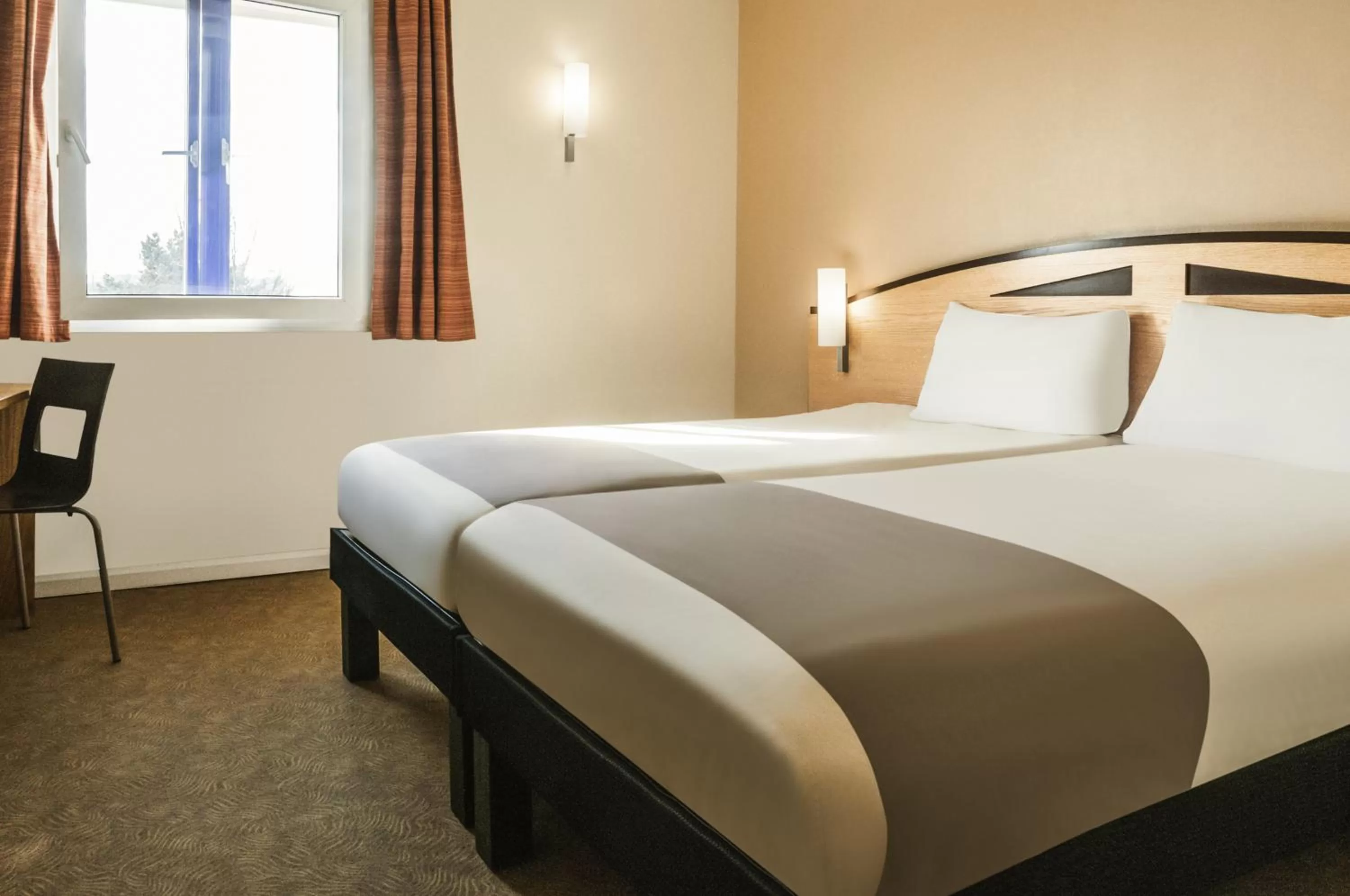 Bedroom in ibis Rotherham East – (M18 / M1)