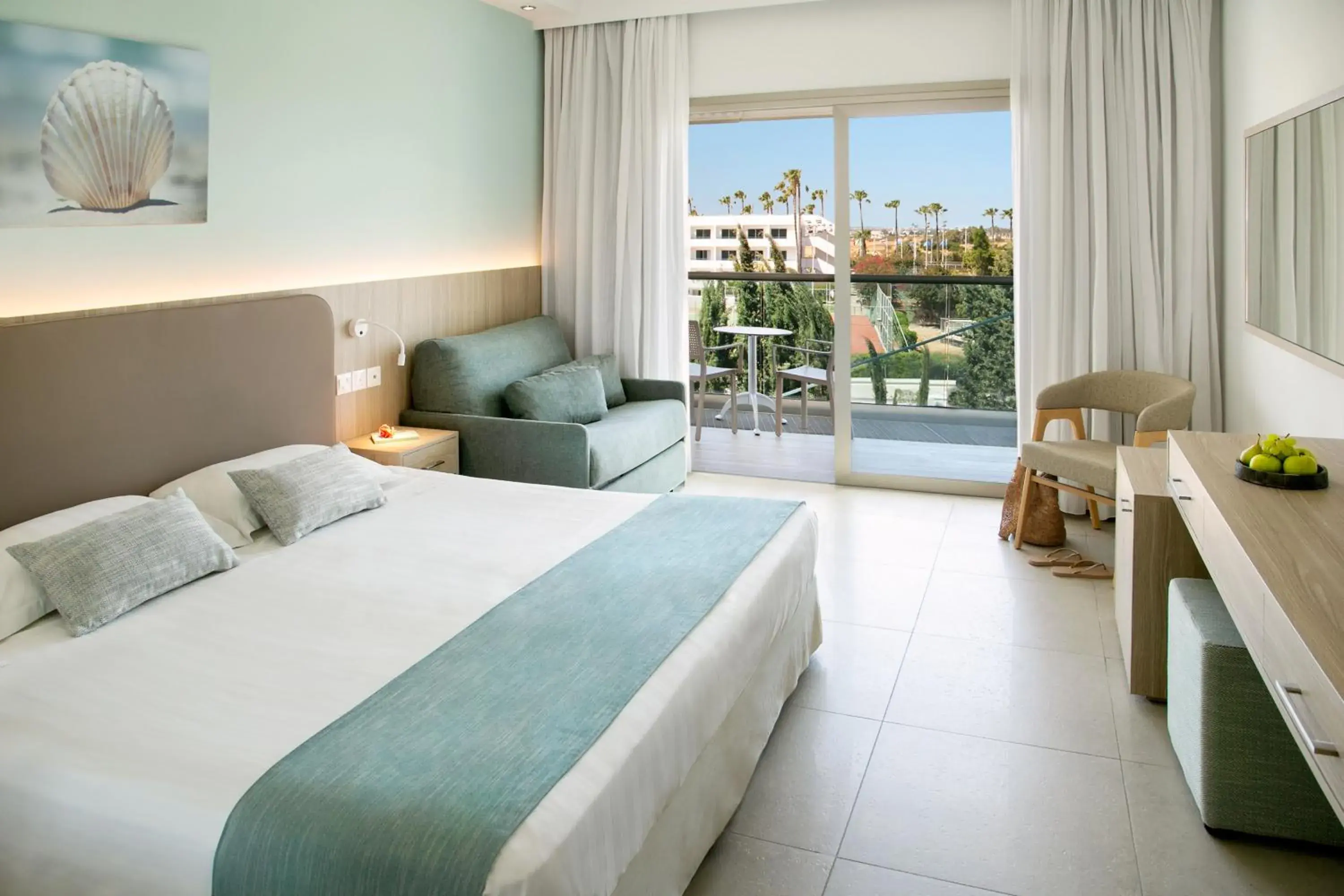 Bed in Asterias Beach Hotel