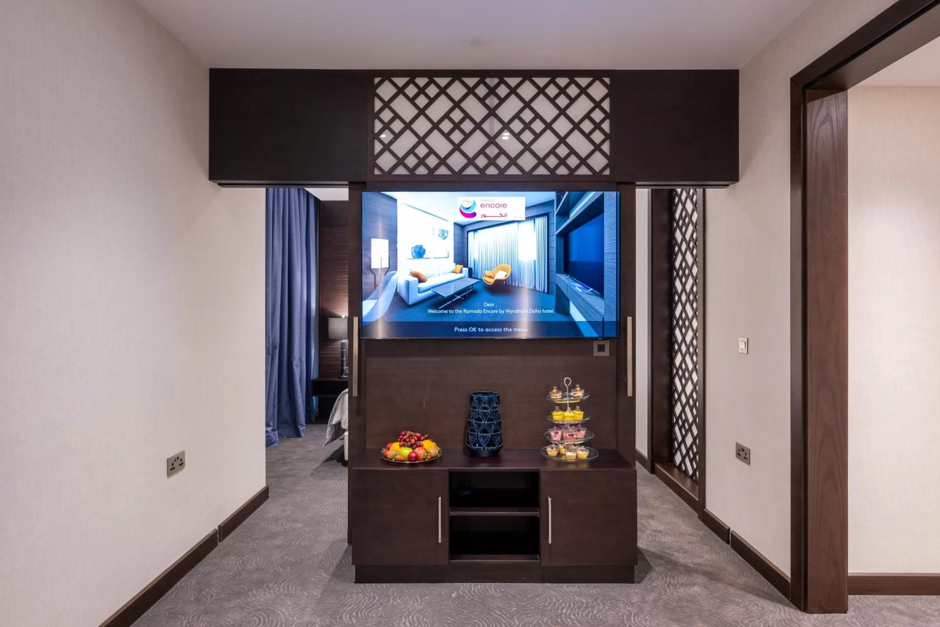 TV and multimedia in Ramada Encore Doha by Wyndham