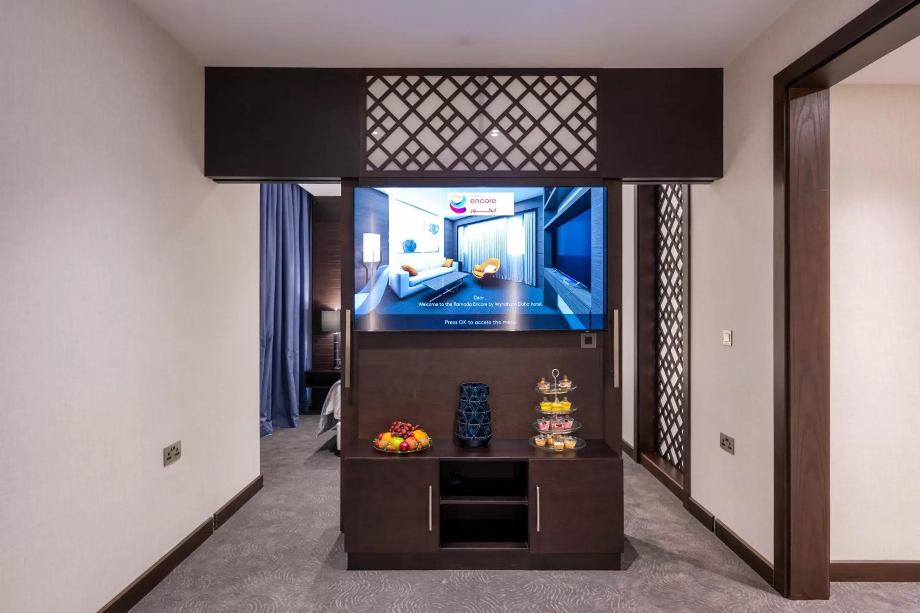 TV and multimedia, TV/Entertainment Center in Ramada Encore Doha by Wyndham