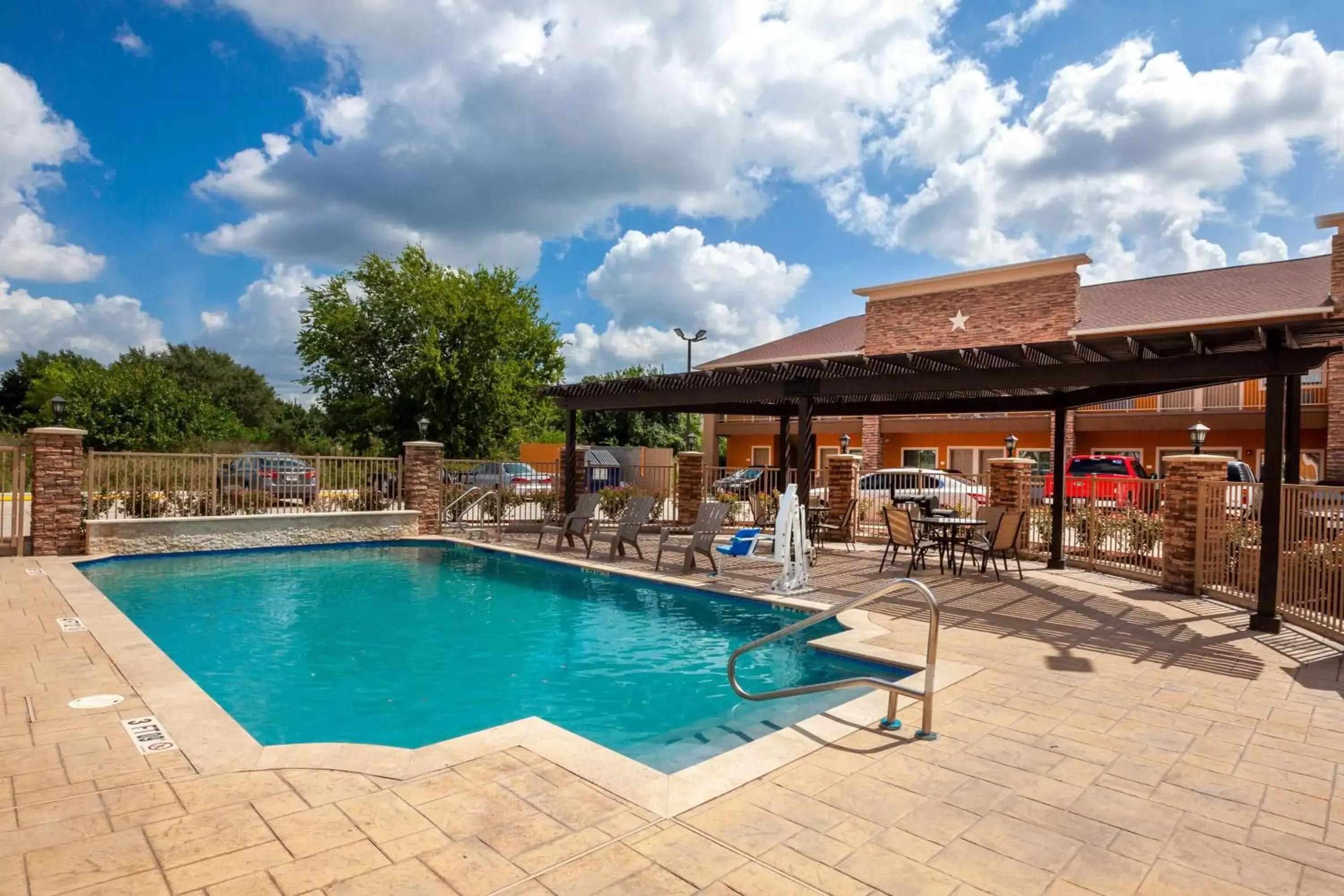 Balcony/Terrace, Swimming Pool in Super 8 by Wyndham Houston Northwest Cypress