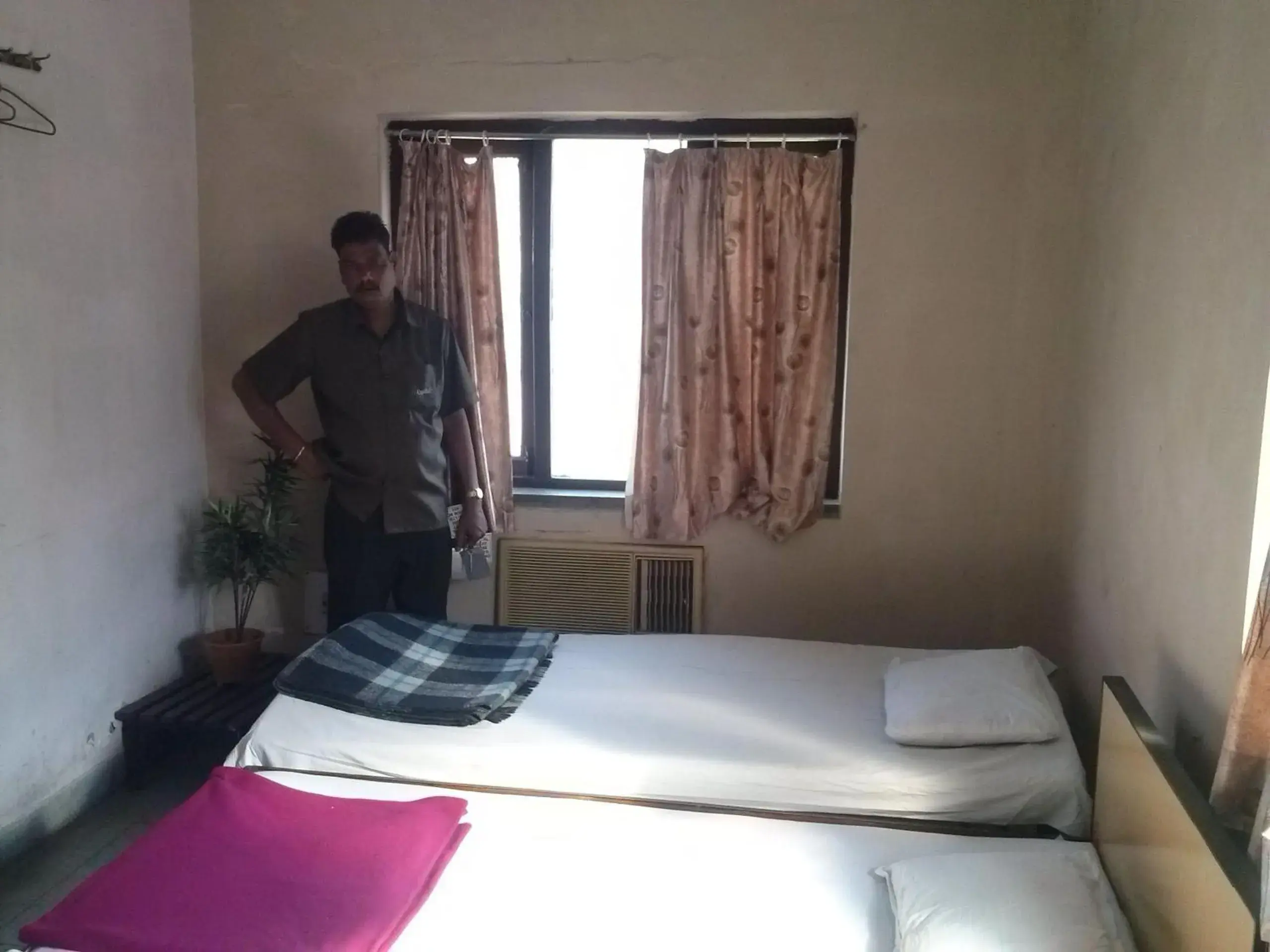 Staff, Bed in Capital Guest House