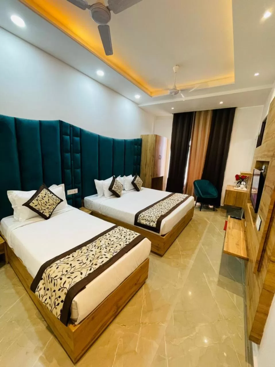 Photo of the whole room in Hotel Dream Town By Cozy Hotels & Resorts