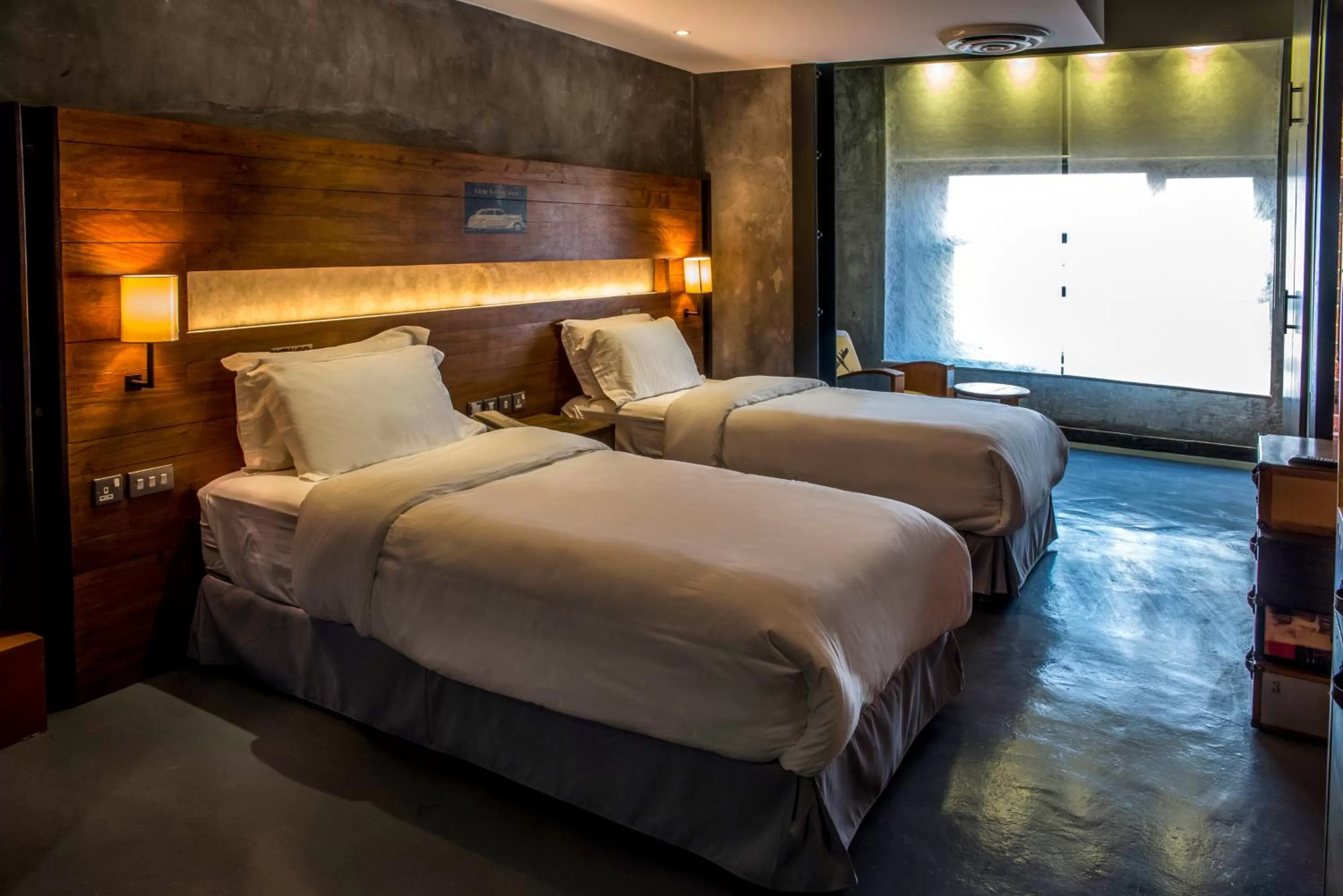 Bed in Flowery Holiday Suites