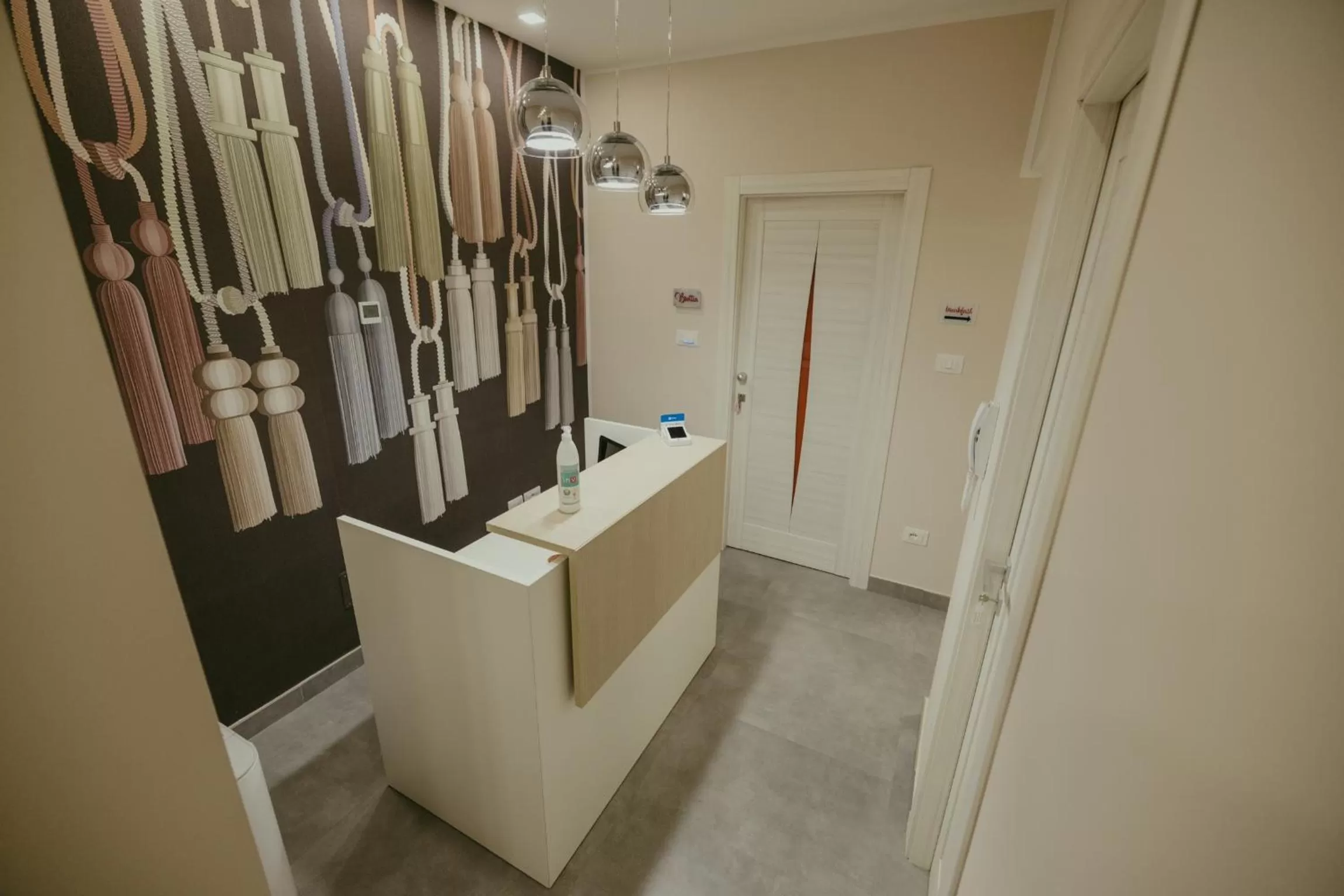 Lobby or reception in Brettia Guest Rooms