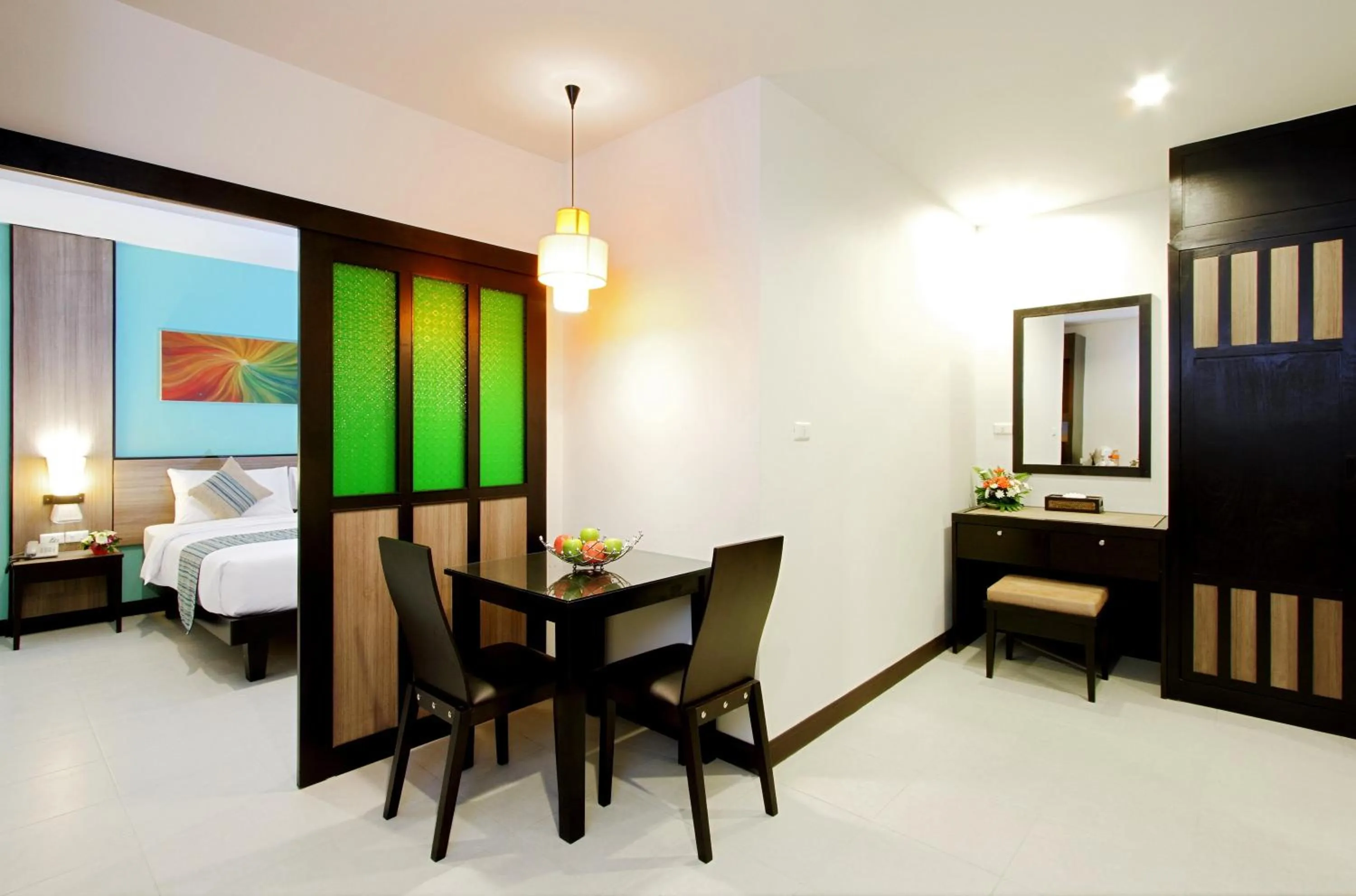 Dining area, Bed in Kata Sea Breeze Resort - SHA Plus