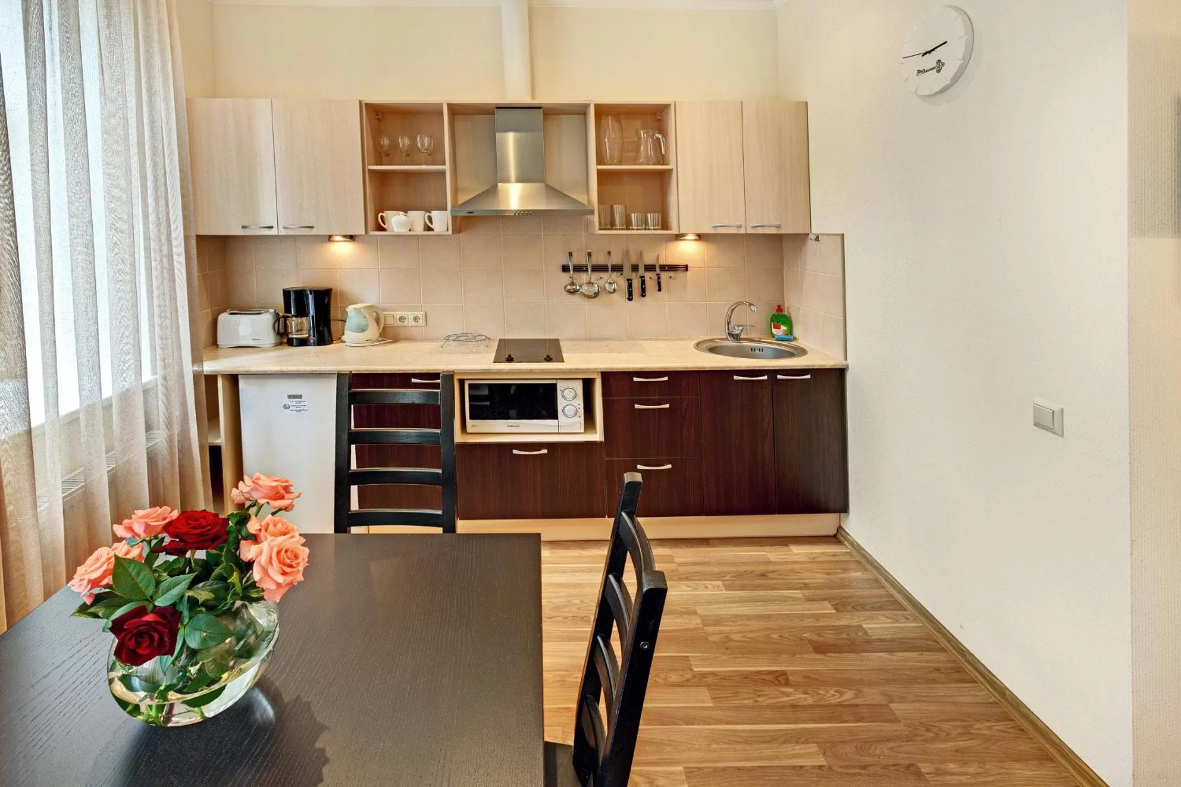 Kitchen or kitchenette in RIGAAPARTMENT SONADA Family Aparthotel - Private Parking