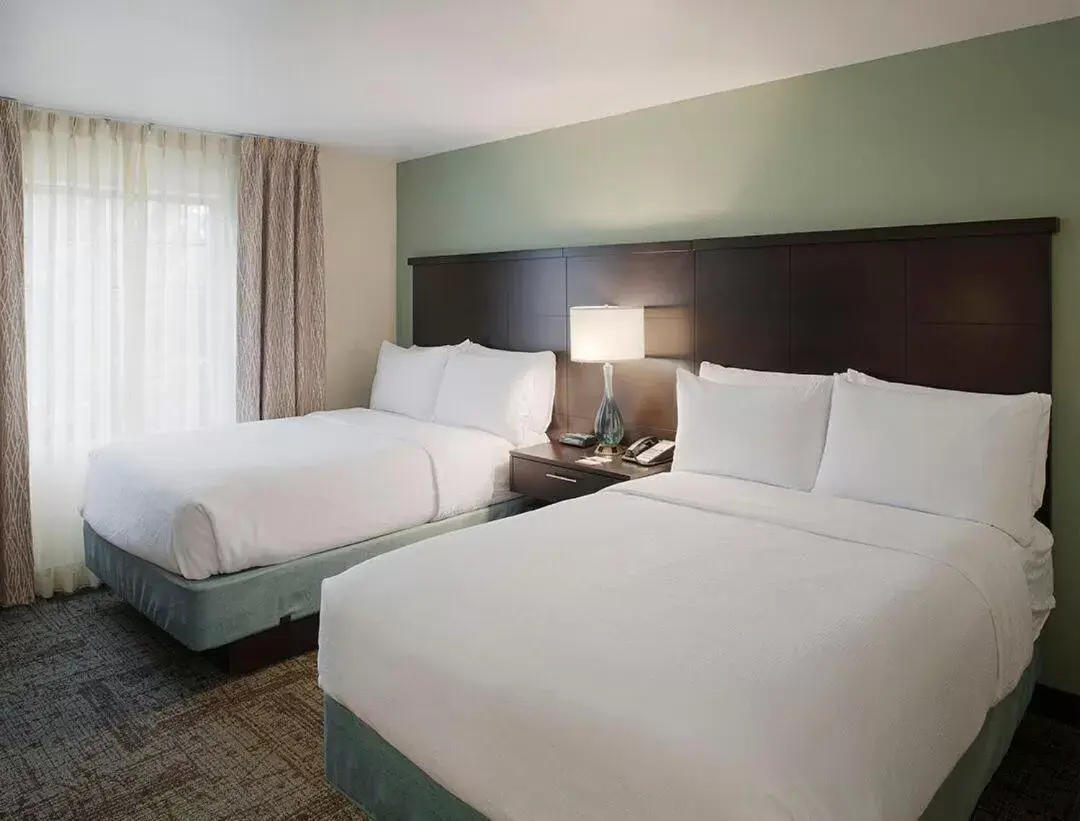 Bed in Staybridge Suites Fayetteville, an IHG Hotel