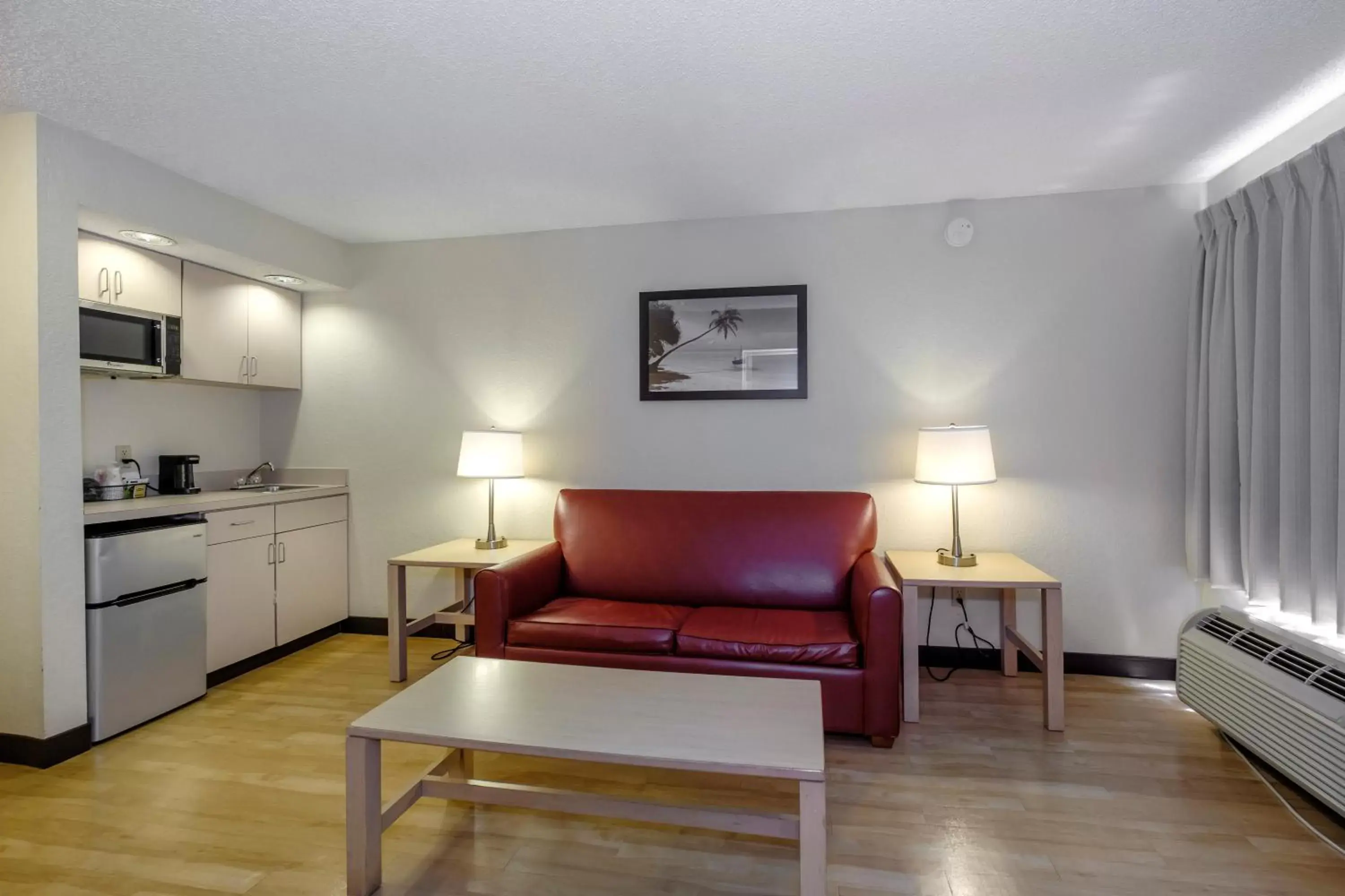 Photo of the whole room, Seating Area in Red Roof Inn PLUS + Gainesville