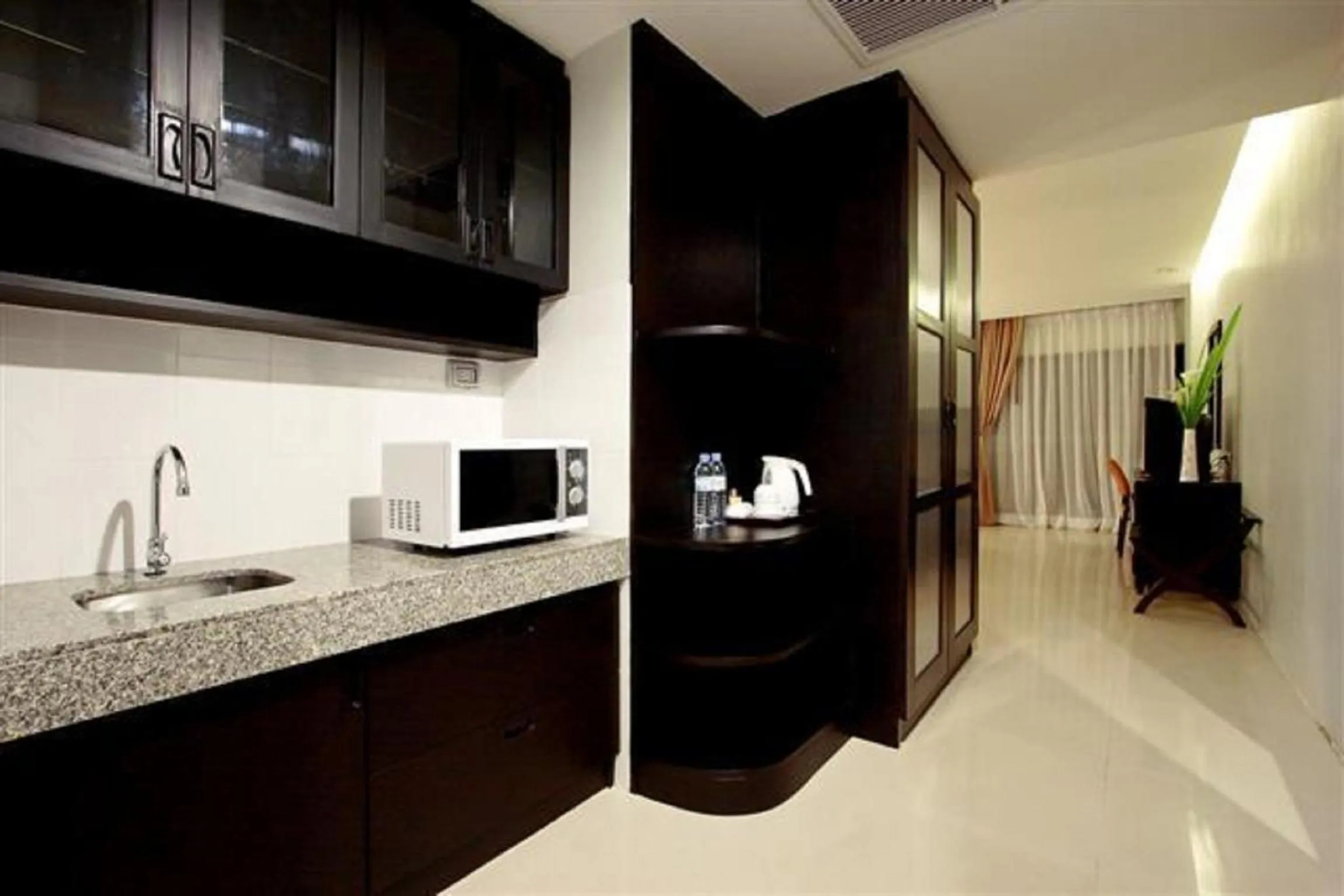 Kitchen or kitchenette in Palmyra Patong Resort Phuket - SHA Extra Plus