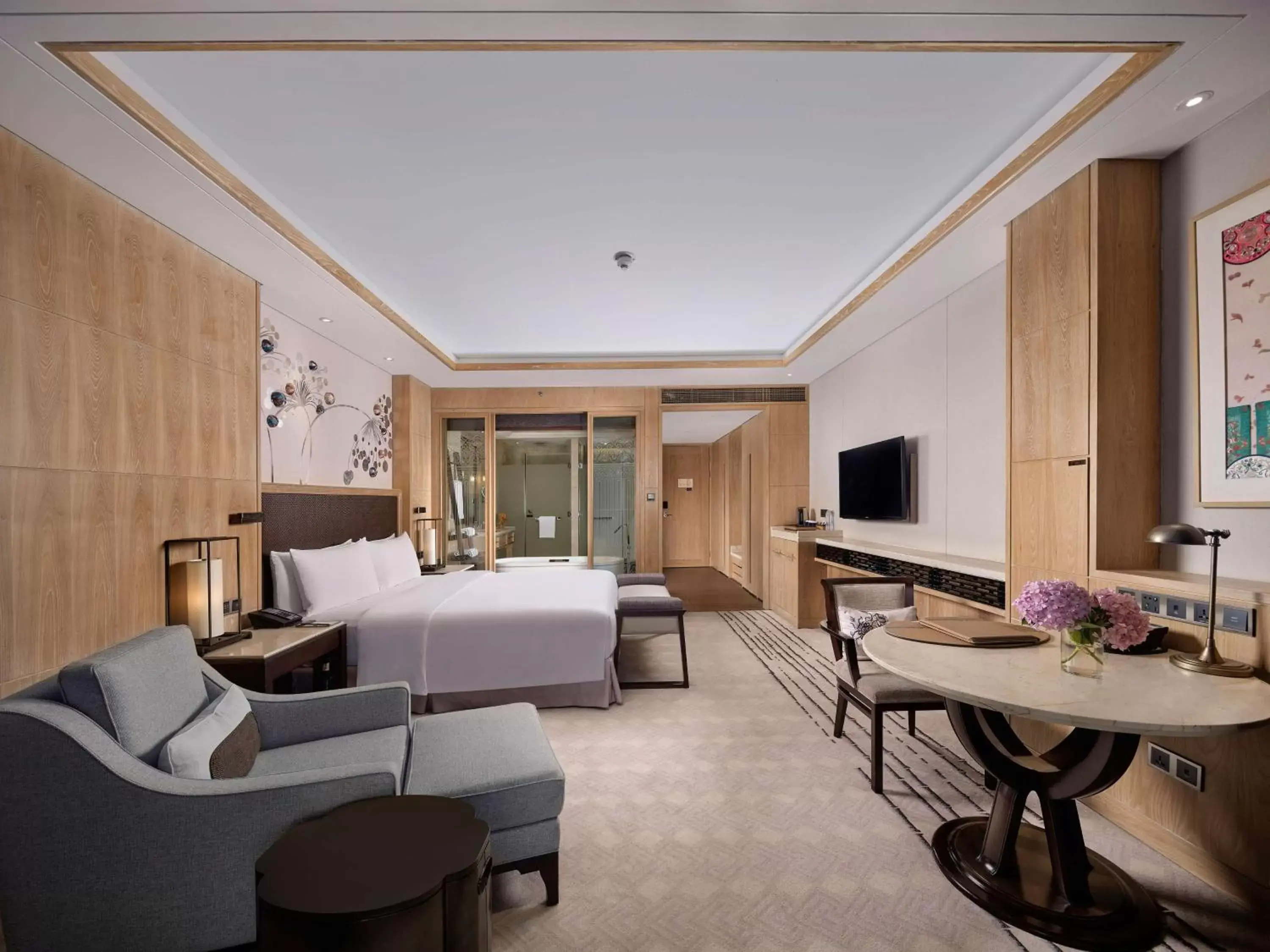 Bed, Seating Area in Hilton Dali Resort & Spa
