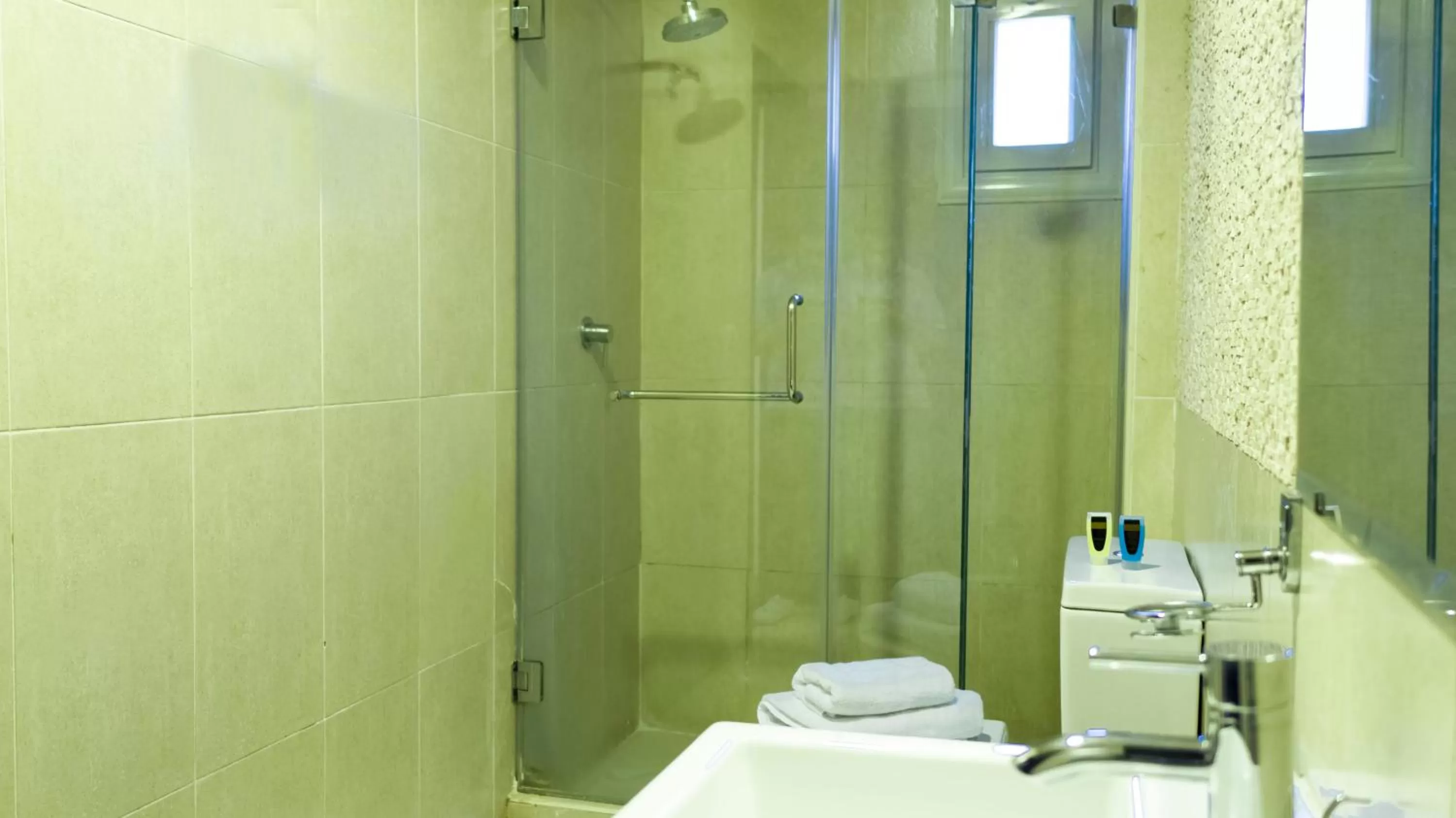 Bathroom in NewCity Hotel & Suites