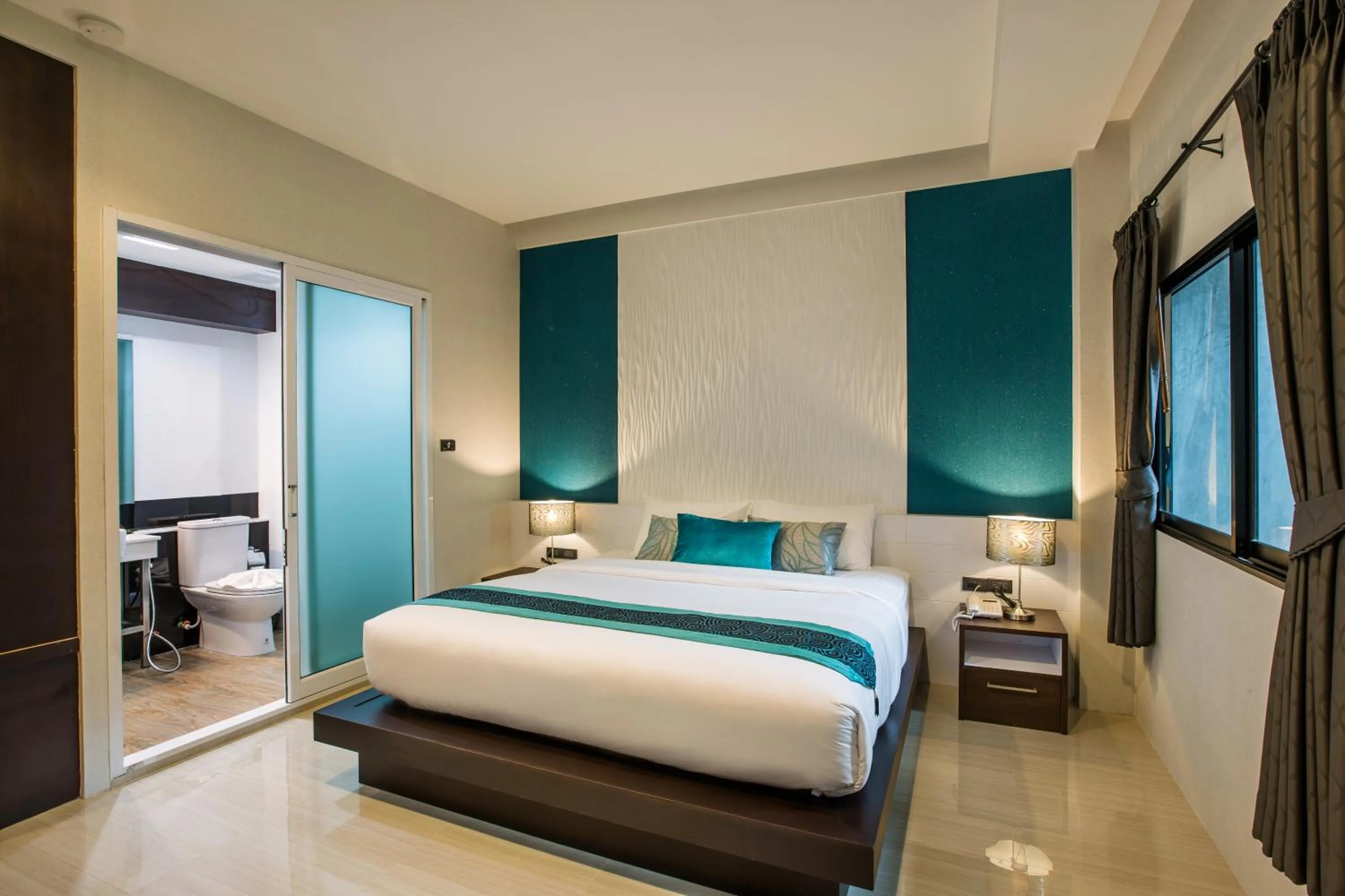 Photo of the whole room, Bed in The Nice Krabi Hotel