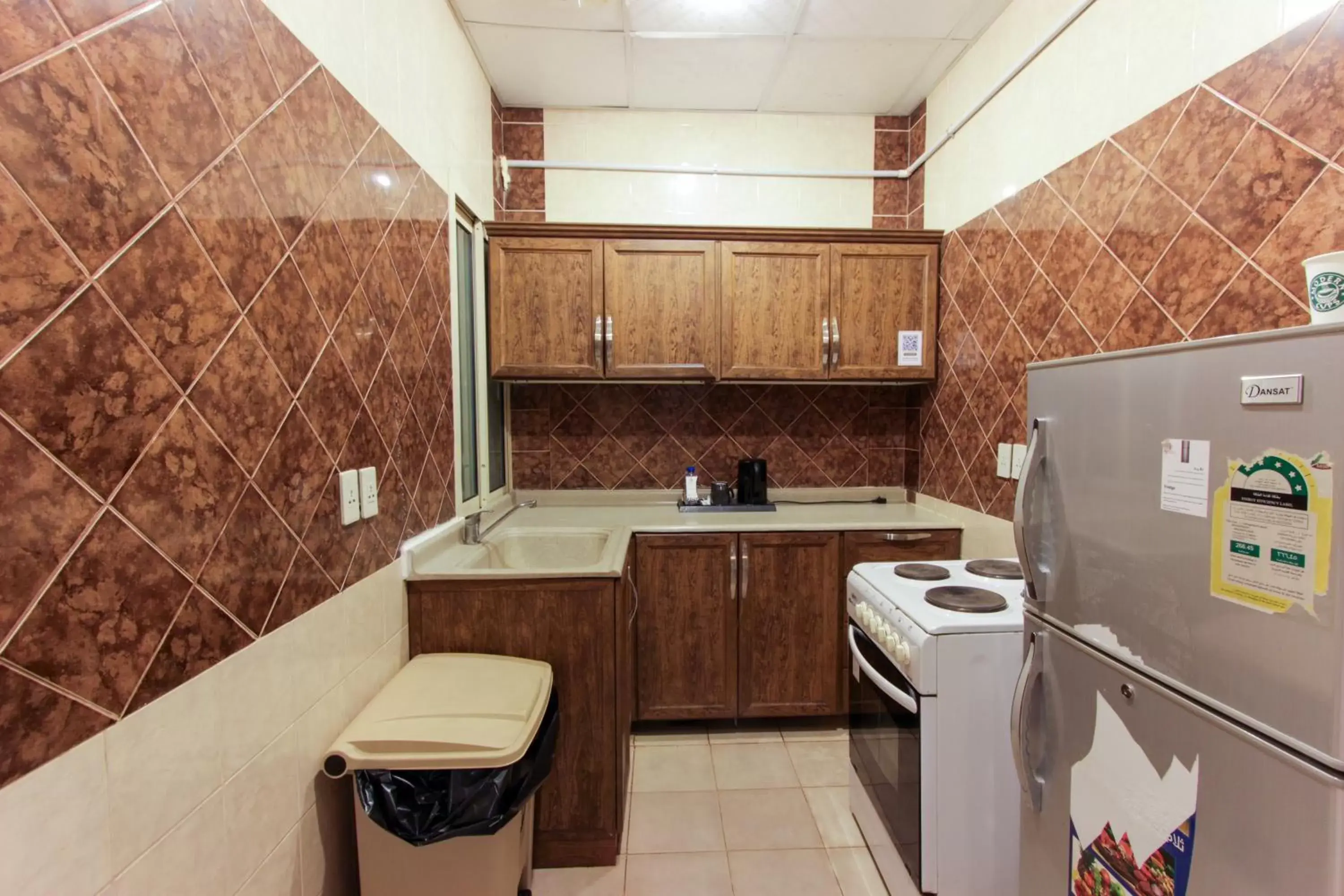 Kitchen or kitchenette, Kitchen/Kitchenette in Maskan Al Dyafah Hotel Apartments 2