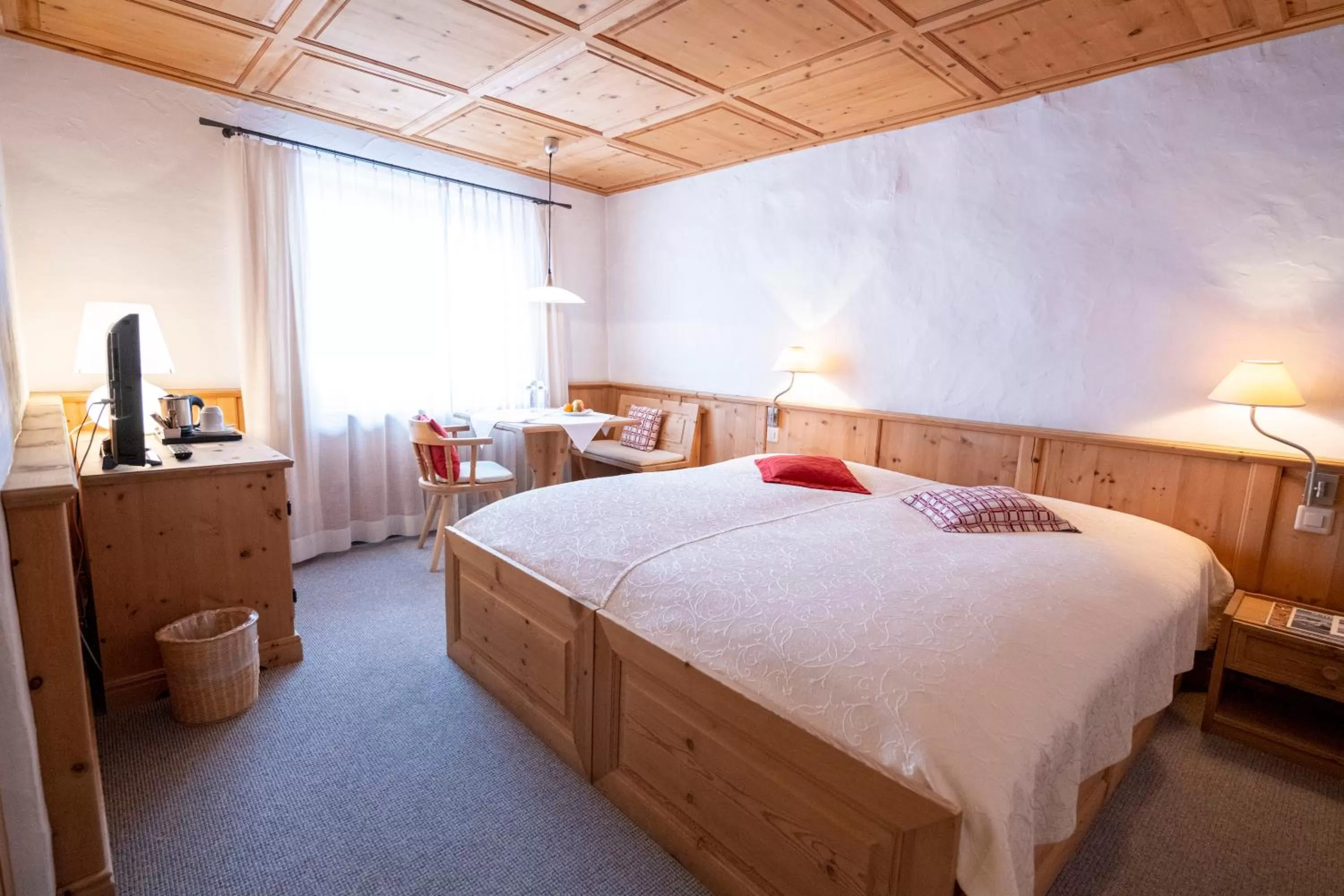 Bed in Hotel Engiadina