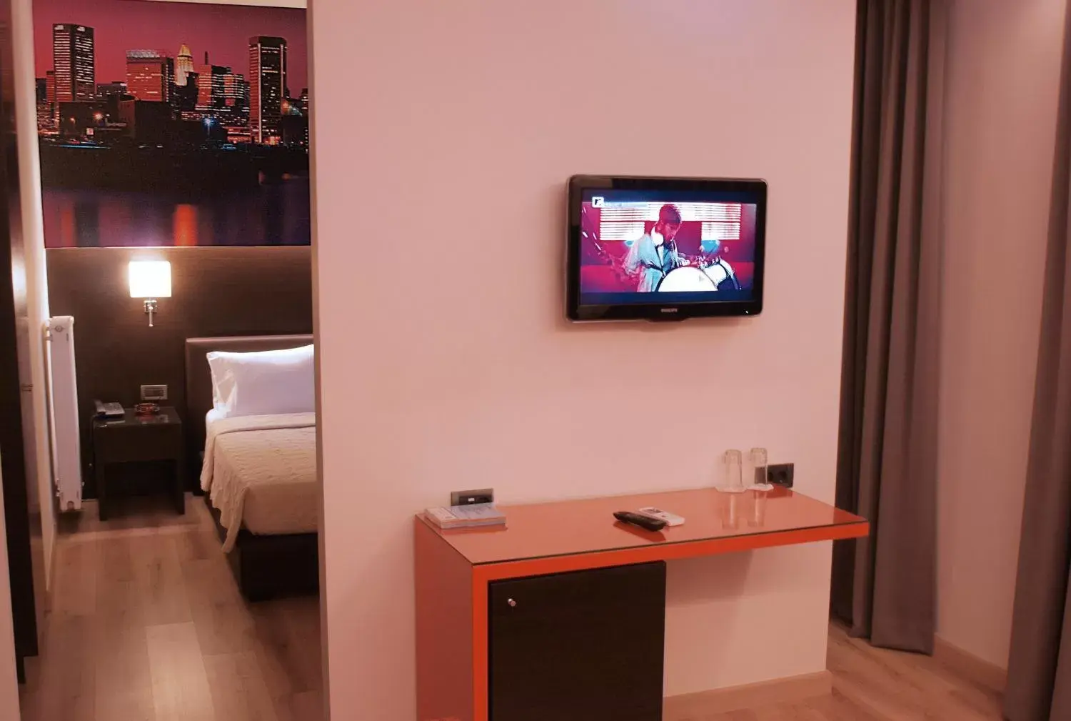 TV and multimedia, TV/Entertainment Center in Athens City Hotel
