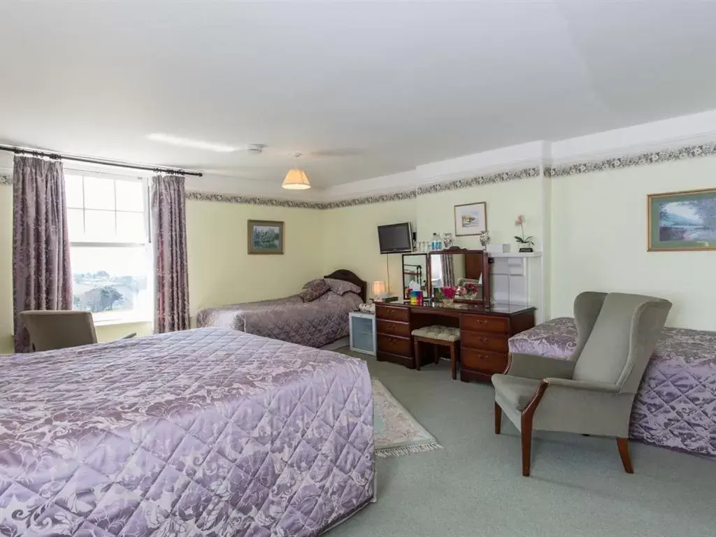 Bedroom in Bucklawren Farm