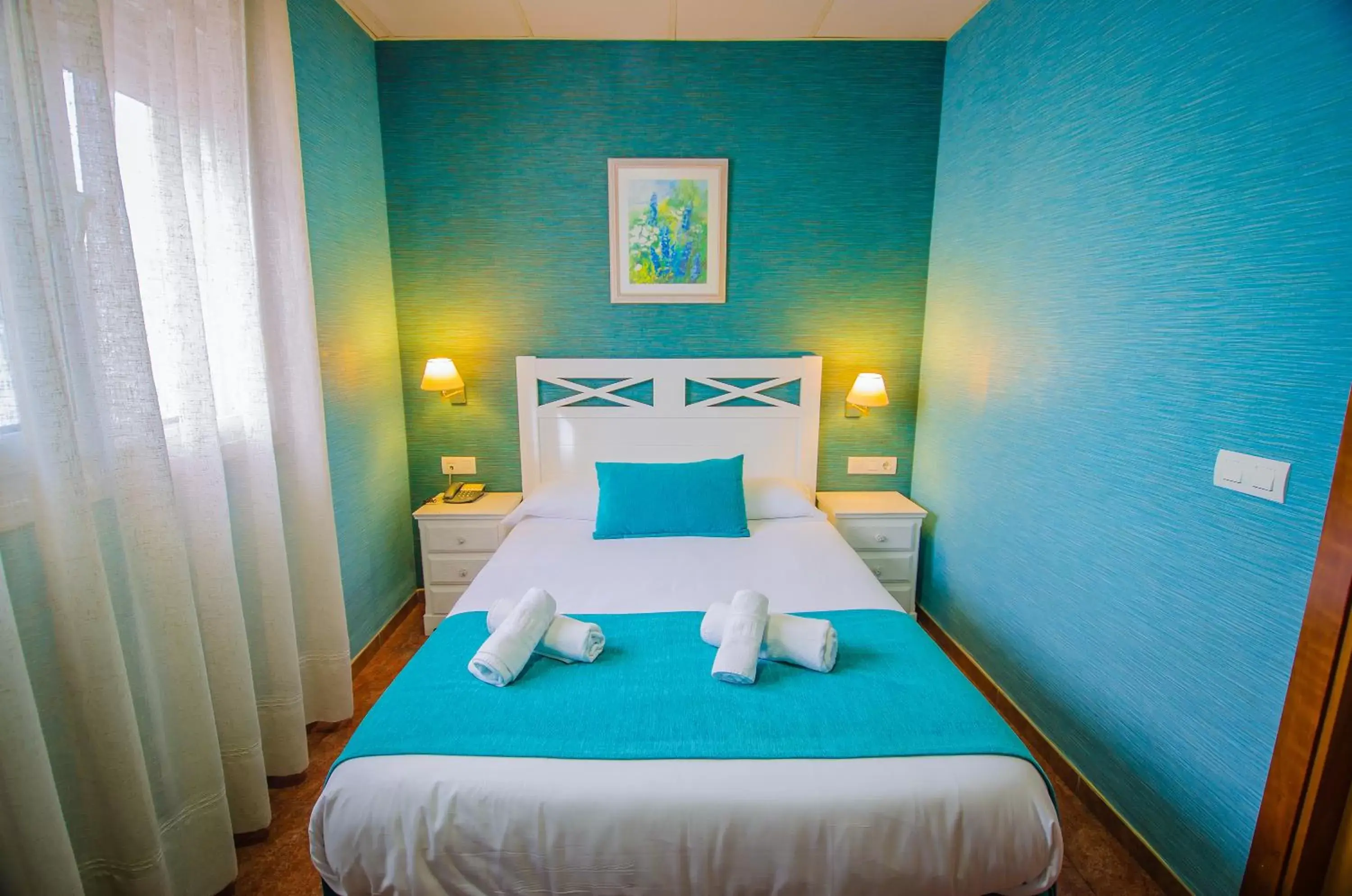 Bed in Hotel Solymar